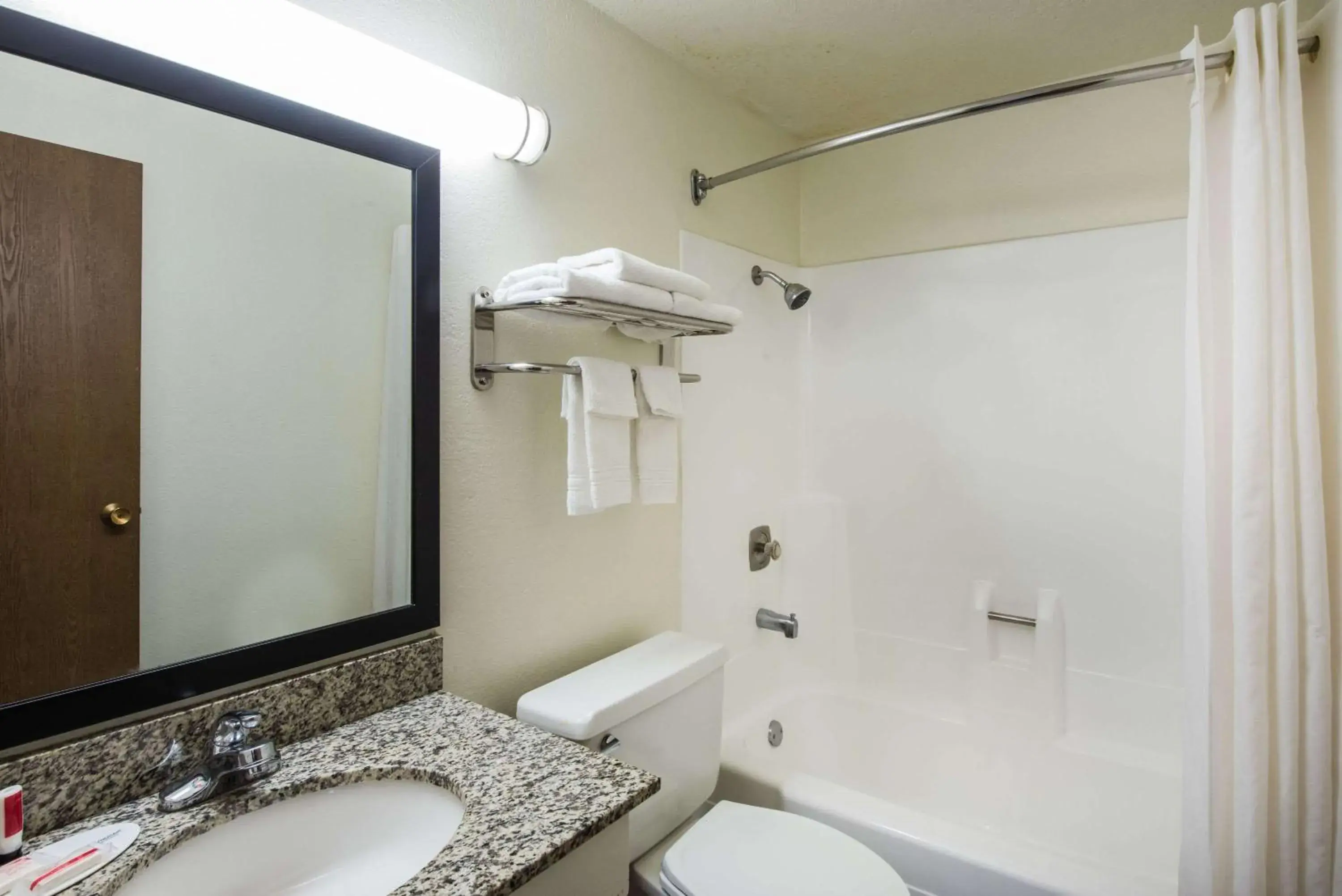 Photo of the whole room, Bathroom in Super 8 by Wyndham Pueblo