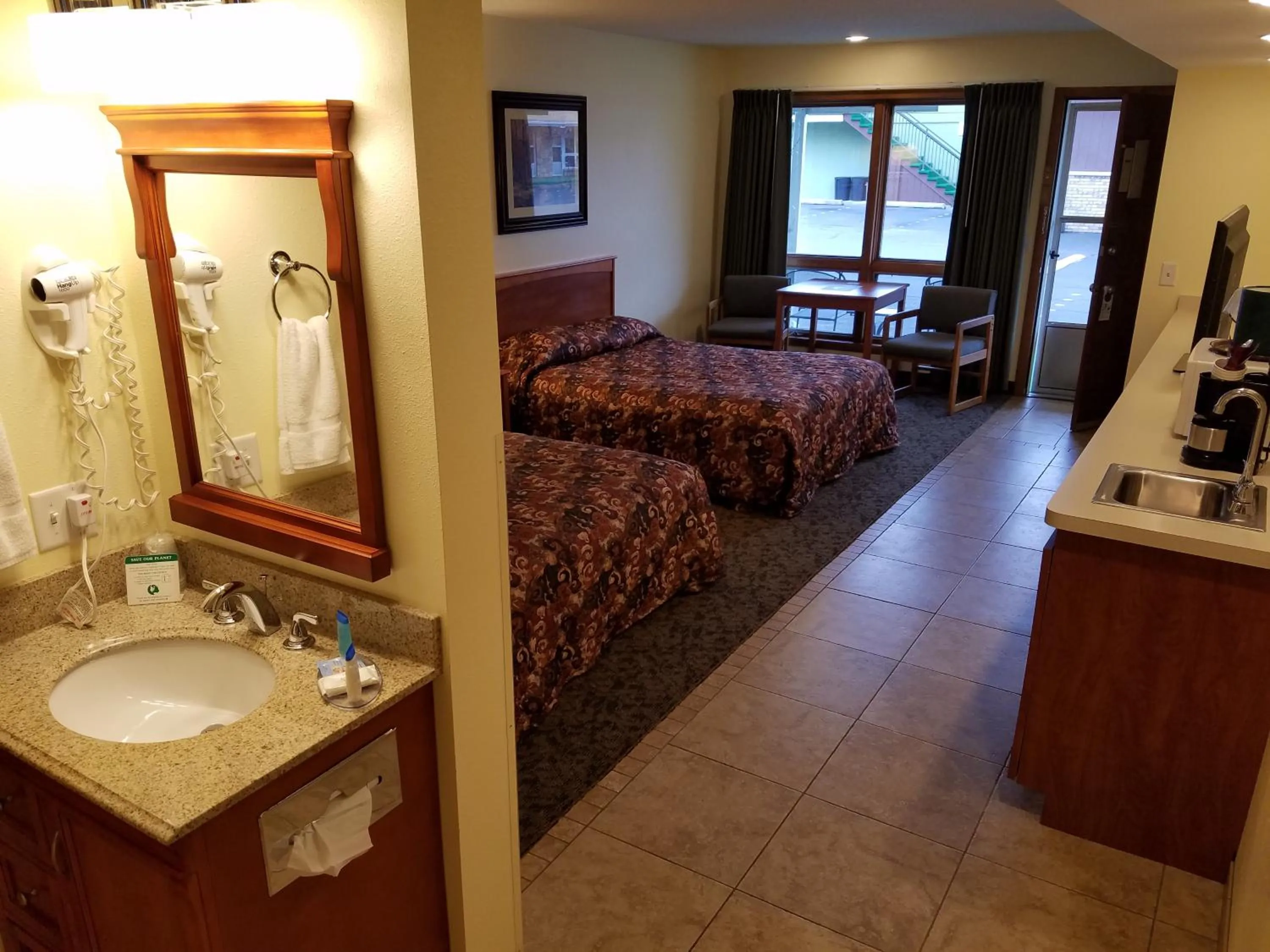 Bed in Black Hawk Motel & Suites