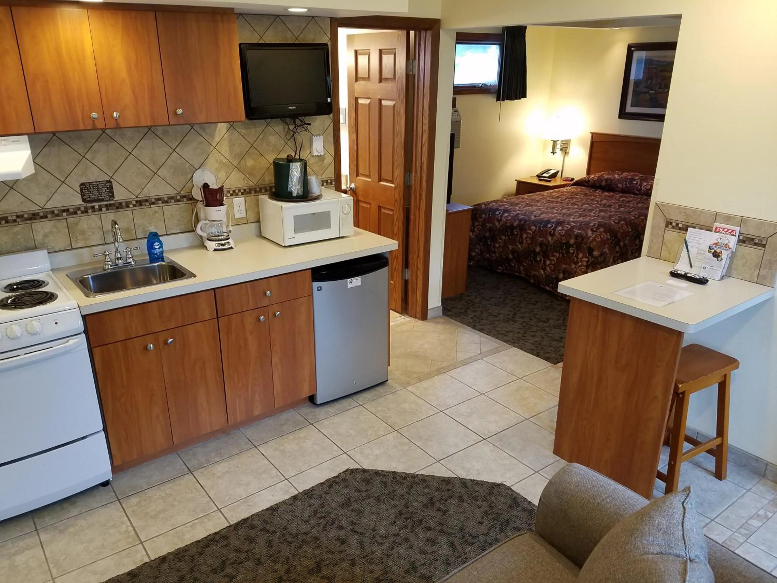 Bed in Black Hawk Motel & Suites