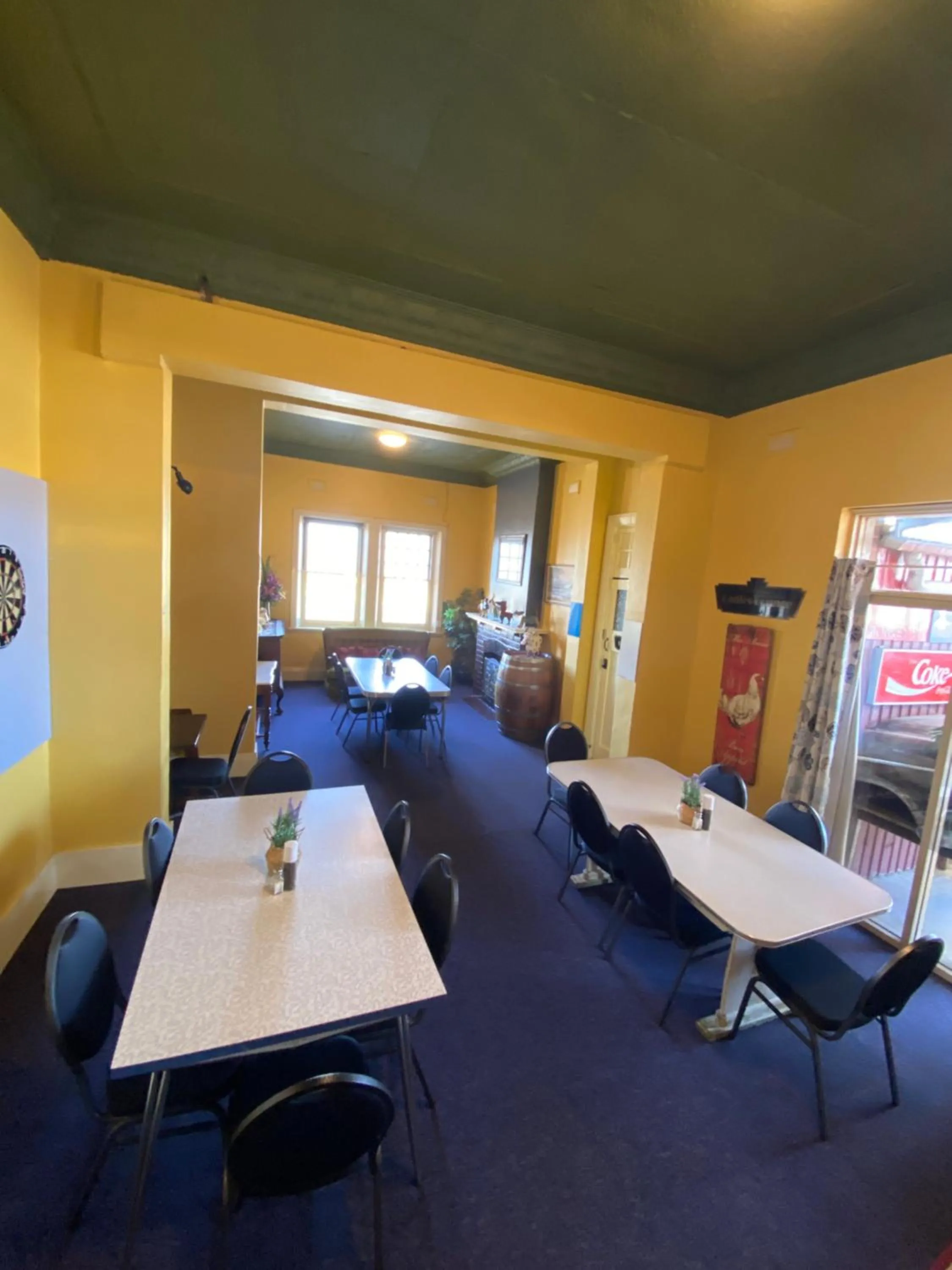 Seating area in COMMERCIAL HOTEL KANIVA call to save dollars
