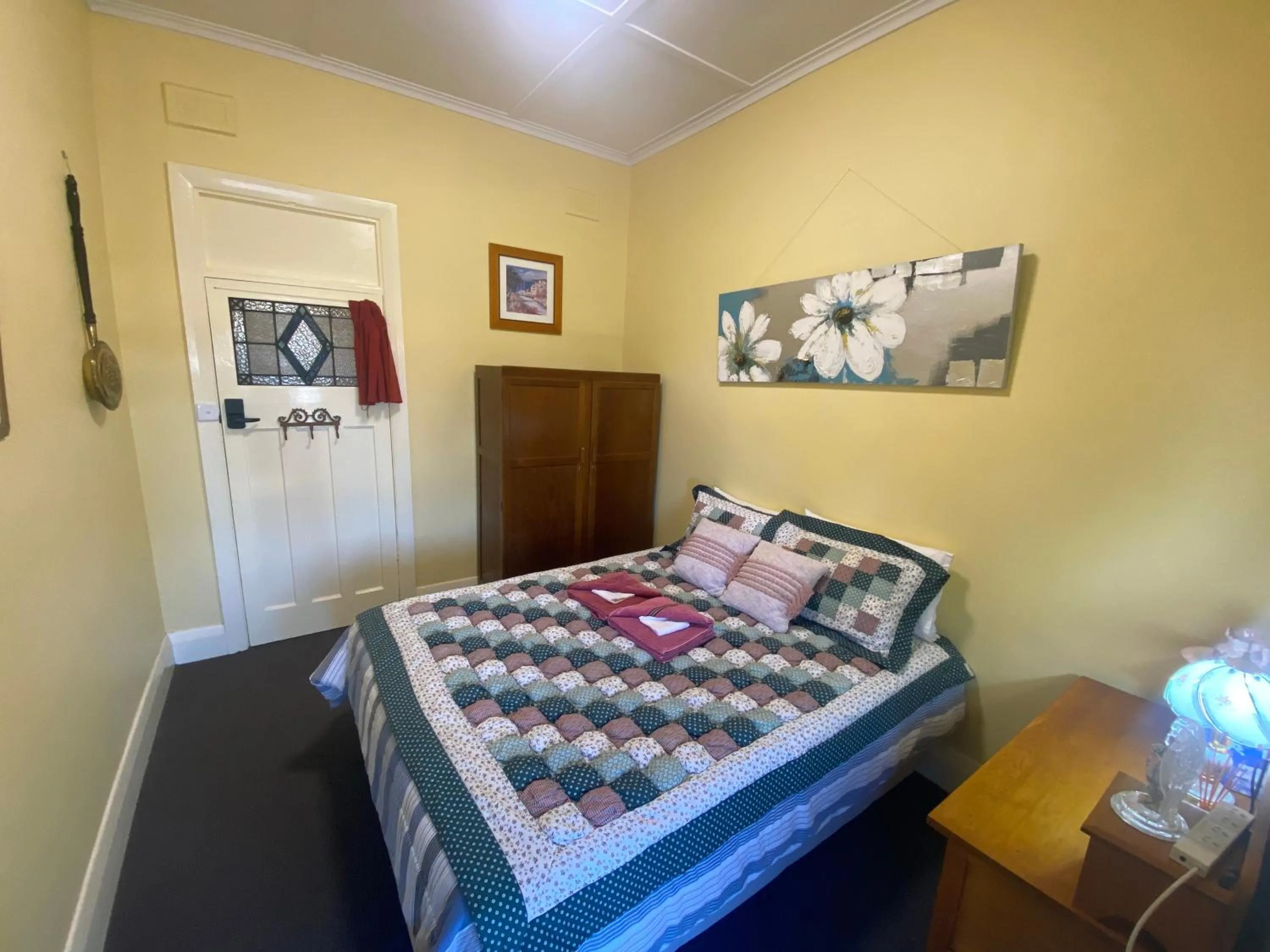 Photo of the whole room, Bed in COMMERCIAL HOTEL KANIVA call to save dollars