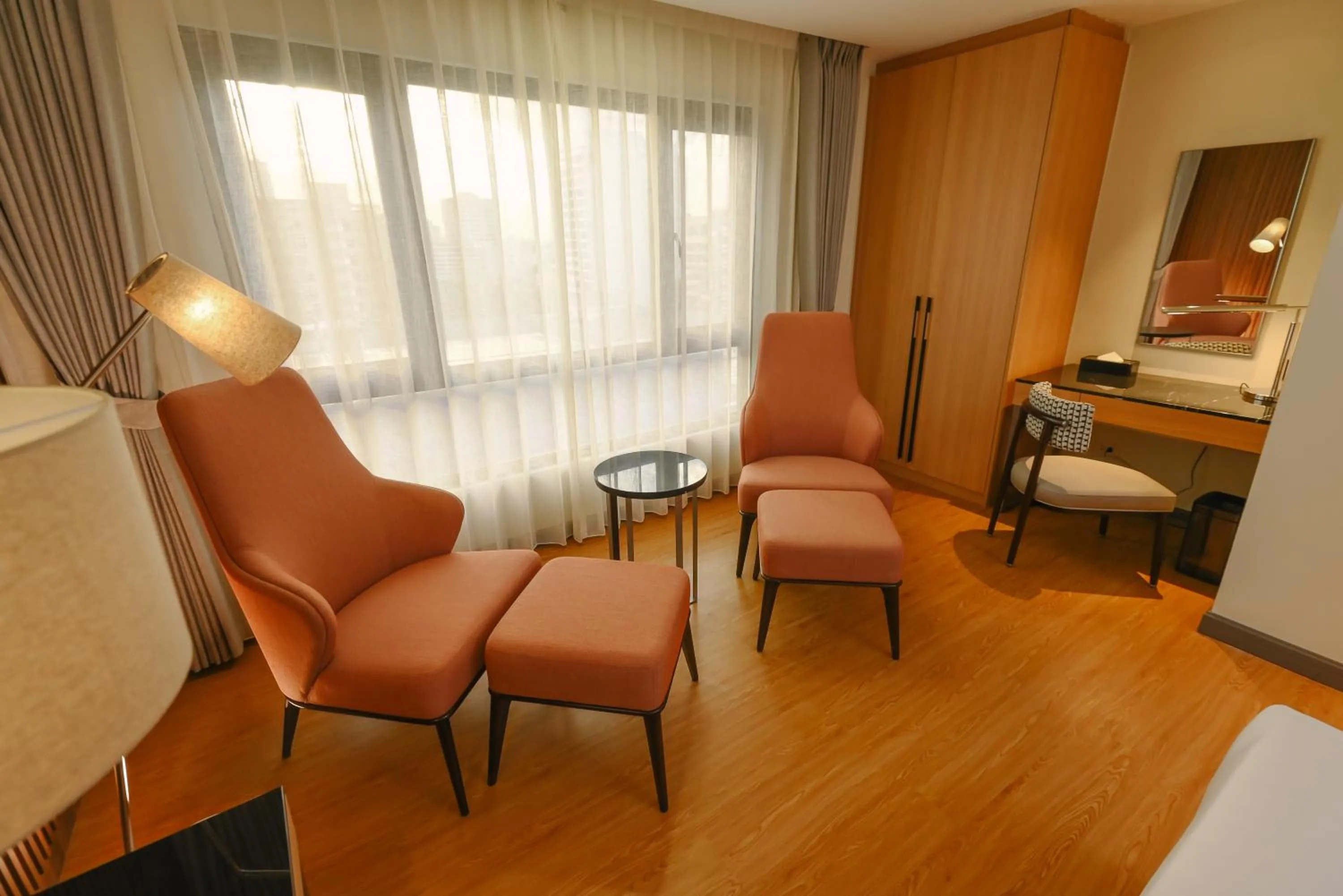 Seating area, Bed in Ardenhills Suites