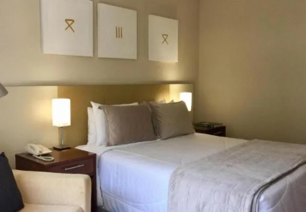 Bed in Grand Plaza Paulista Hotel