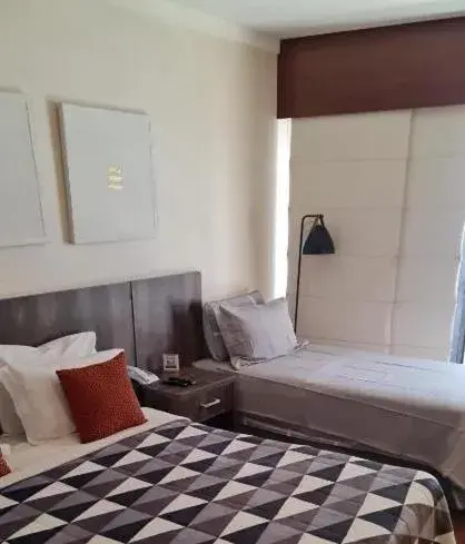 Bed in Grand Plaza Paulista Hotel Bed in Grand Plaza Paulista Hotel