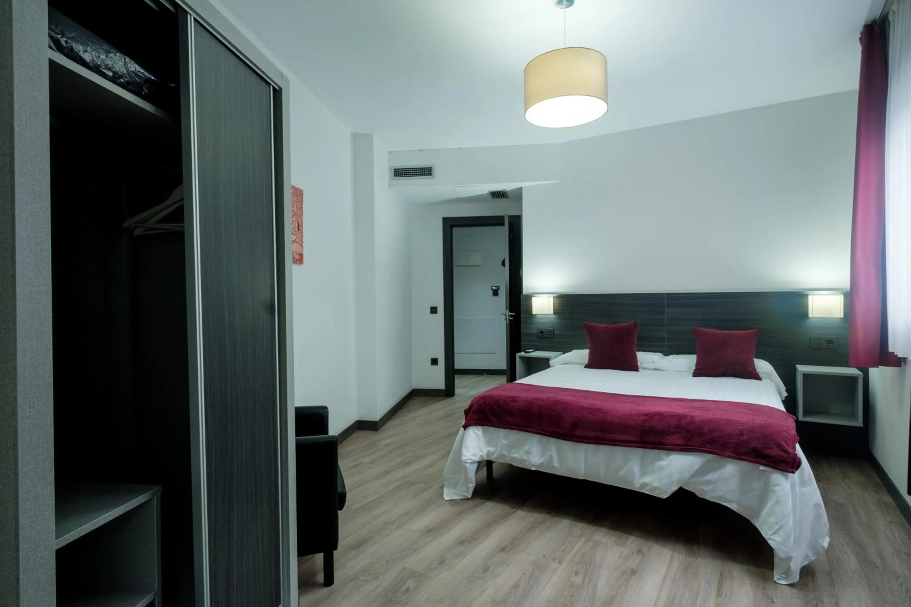 Bedroom, Bed in Apartamentos Capua