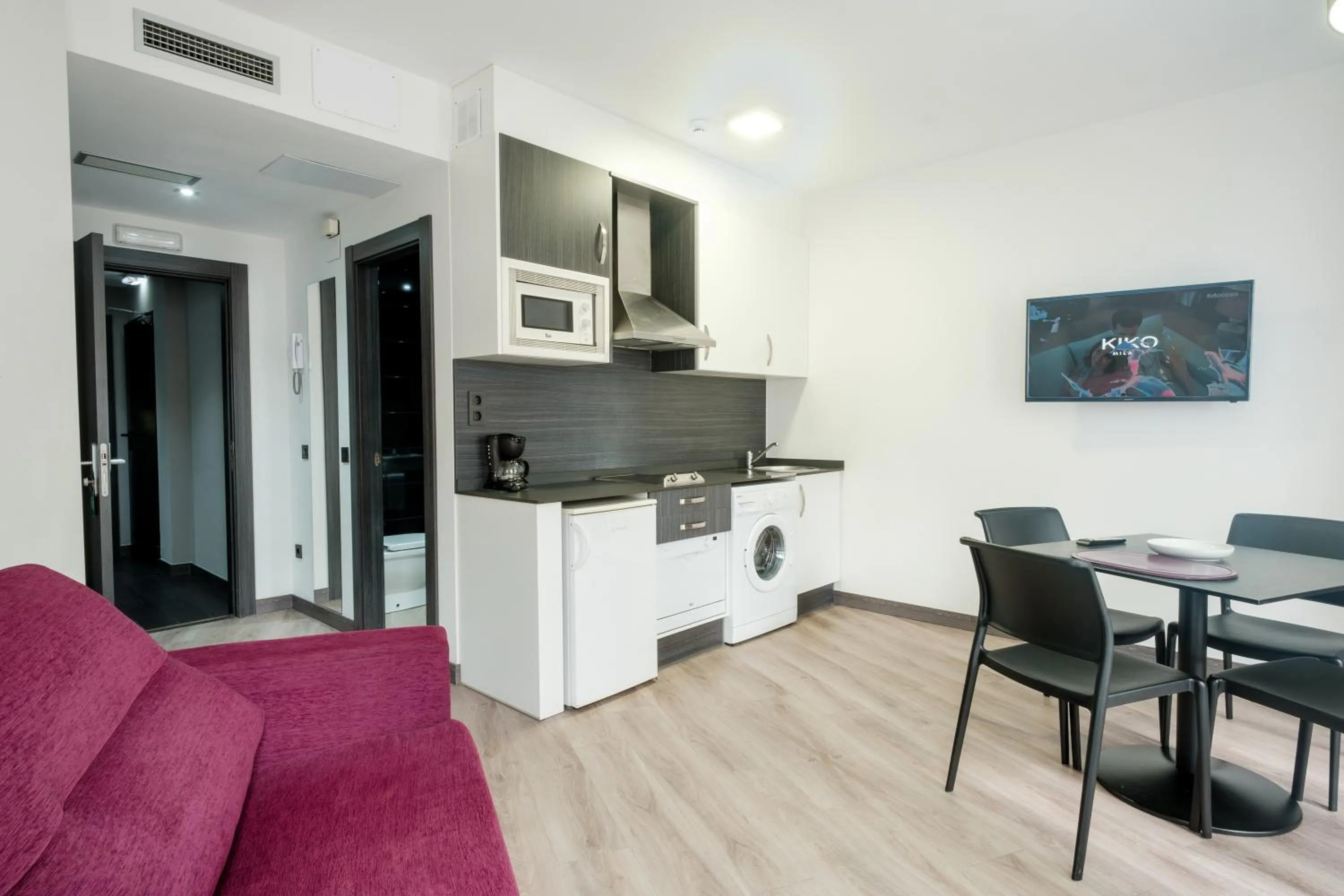 Kitchen or kitchenette in Apartamentos Capua