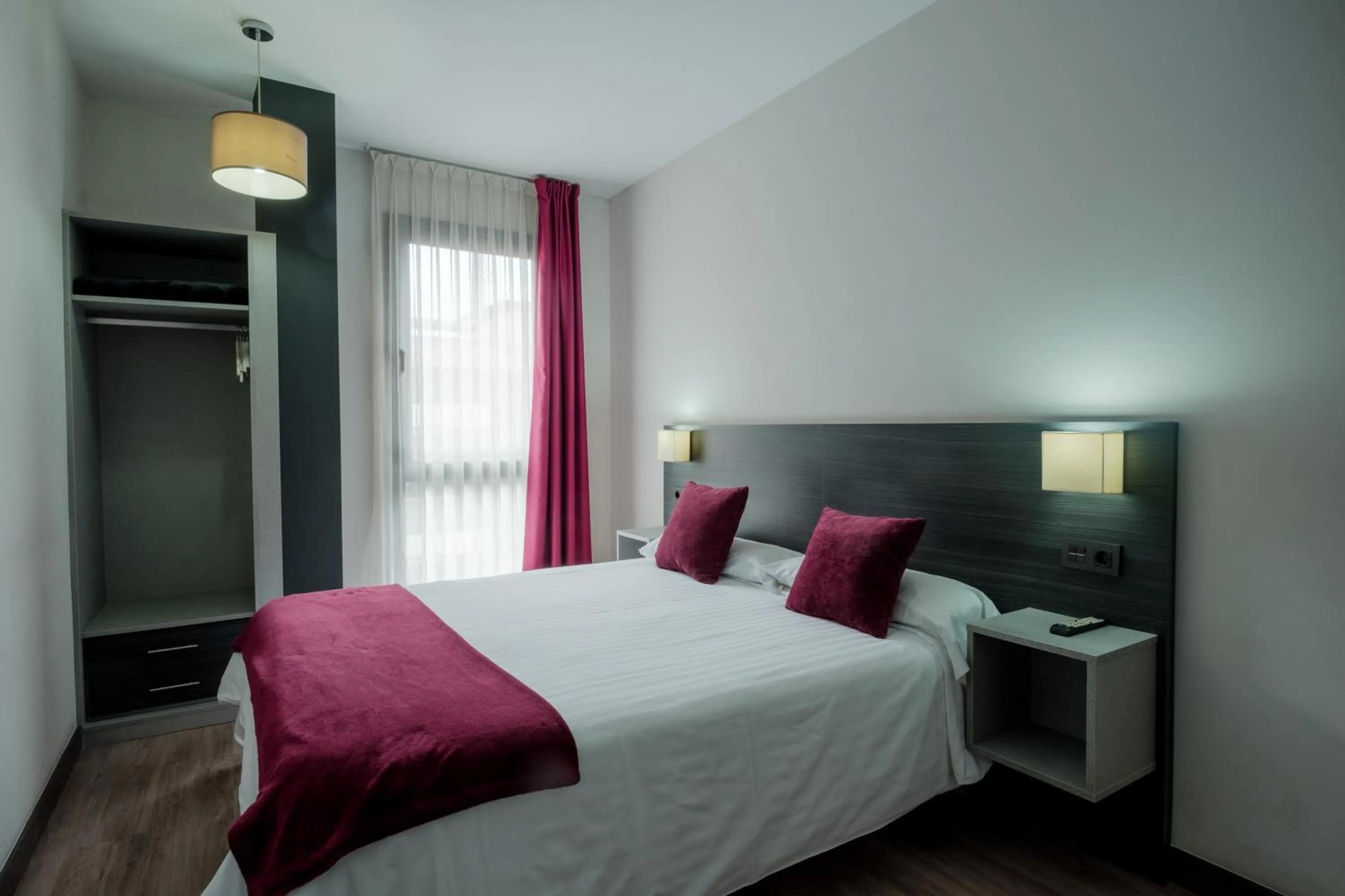 Bedroom, Bed in Apartamentos Capua