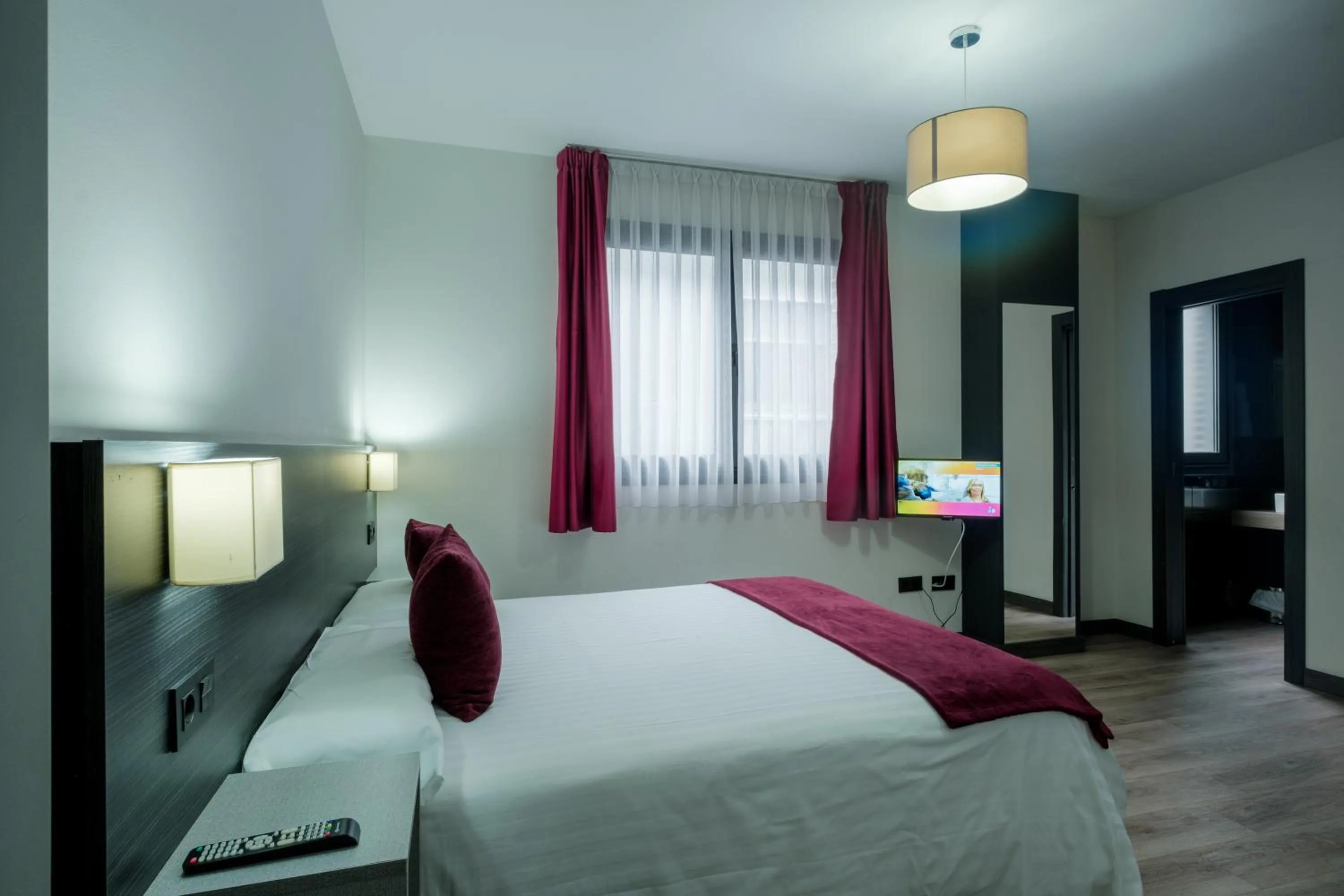 Bedroom, Bed in Apartamentos Capua