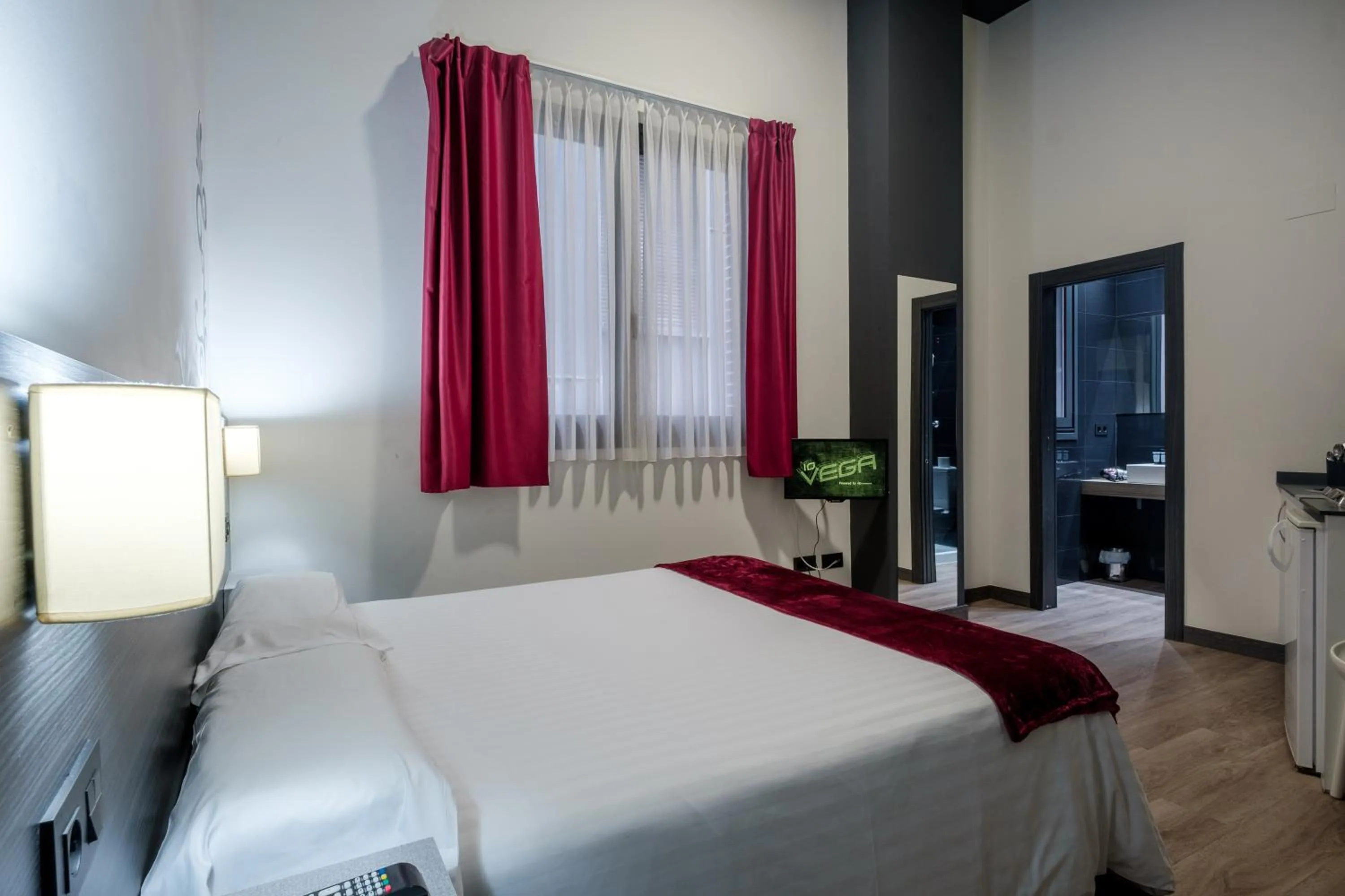 Photo of the whole room, Bed in Apartamentos Capua