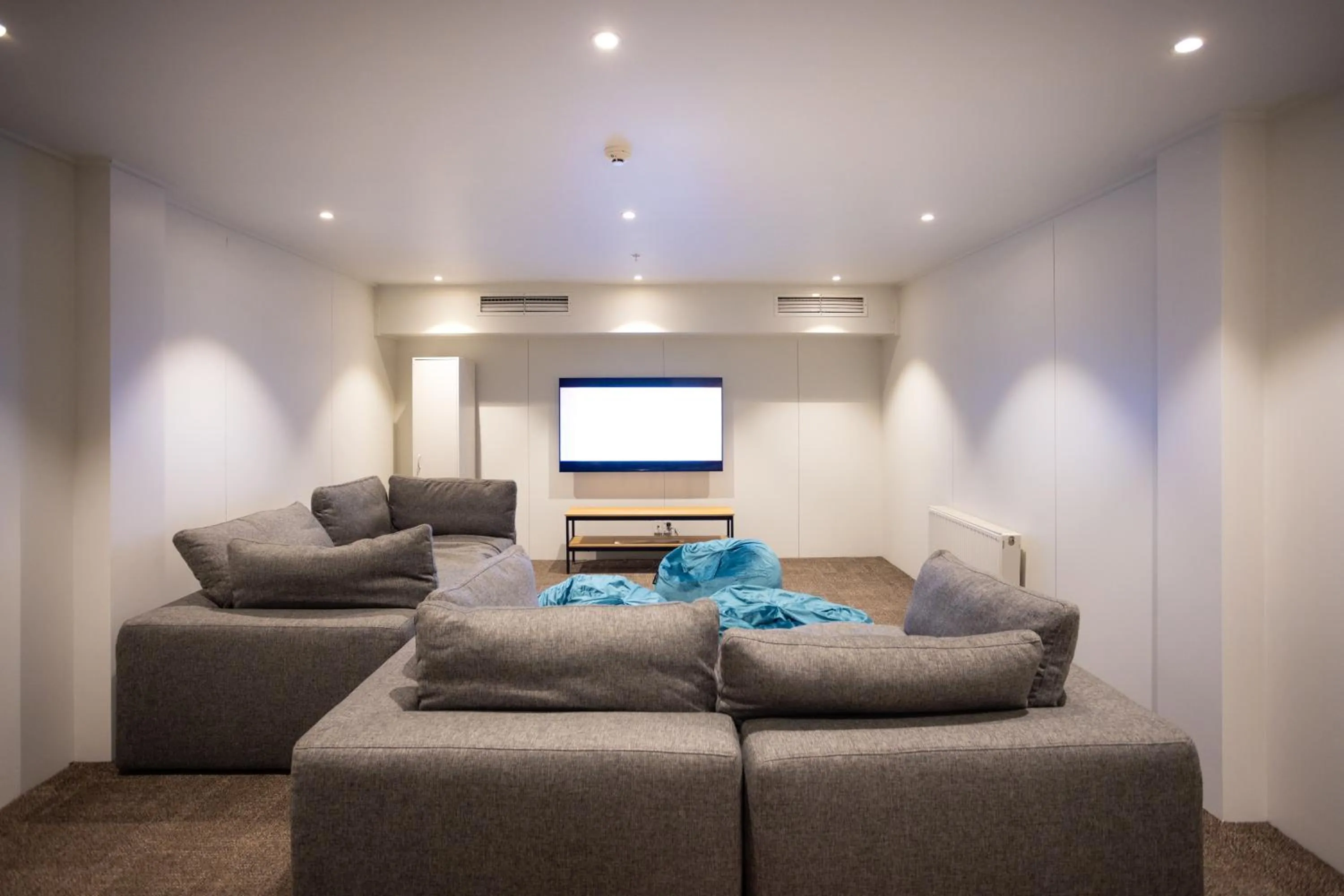 Communal lounge/ TV room in The Brownston Hostel