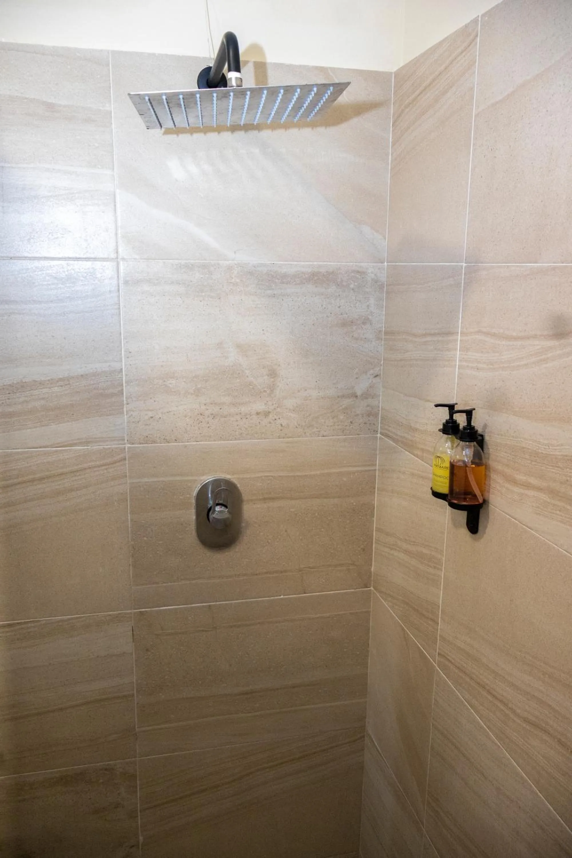 Shower in Ammare Hotel Boutique