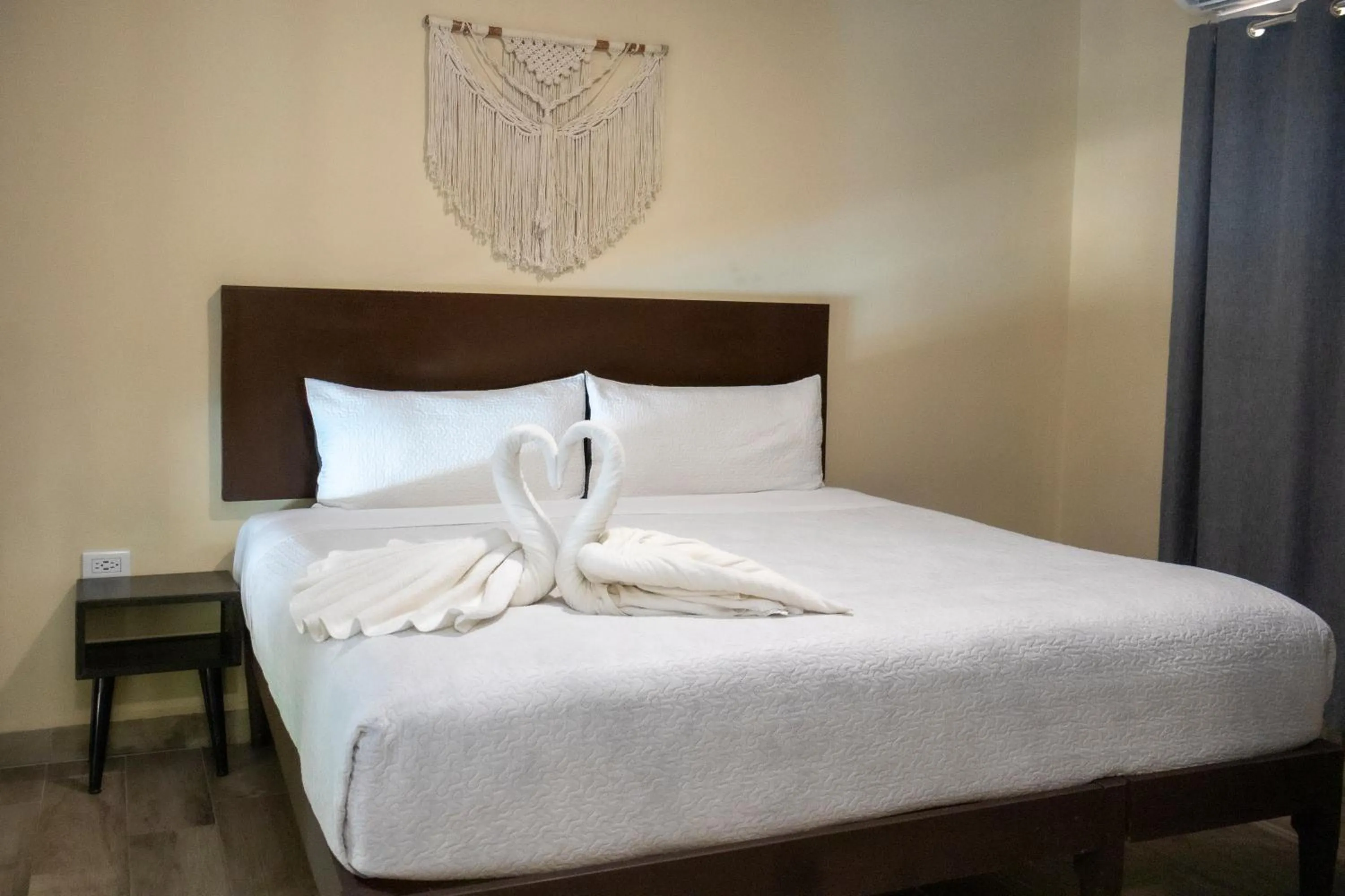 Bed in Ammare Hotel Boutique