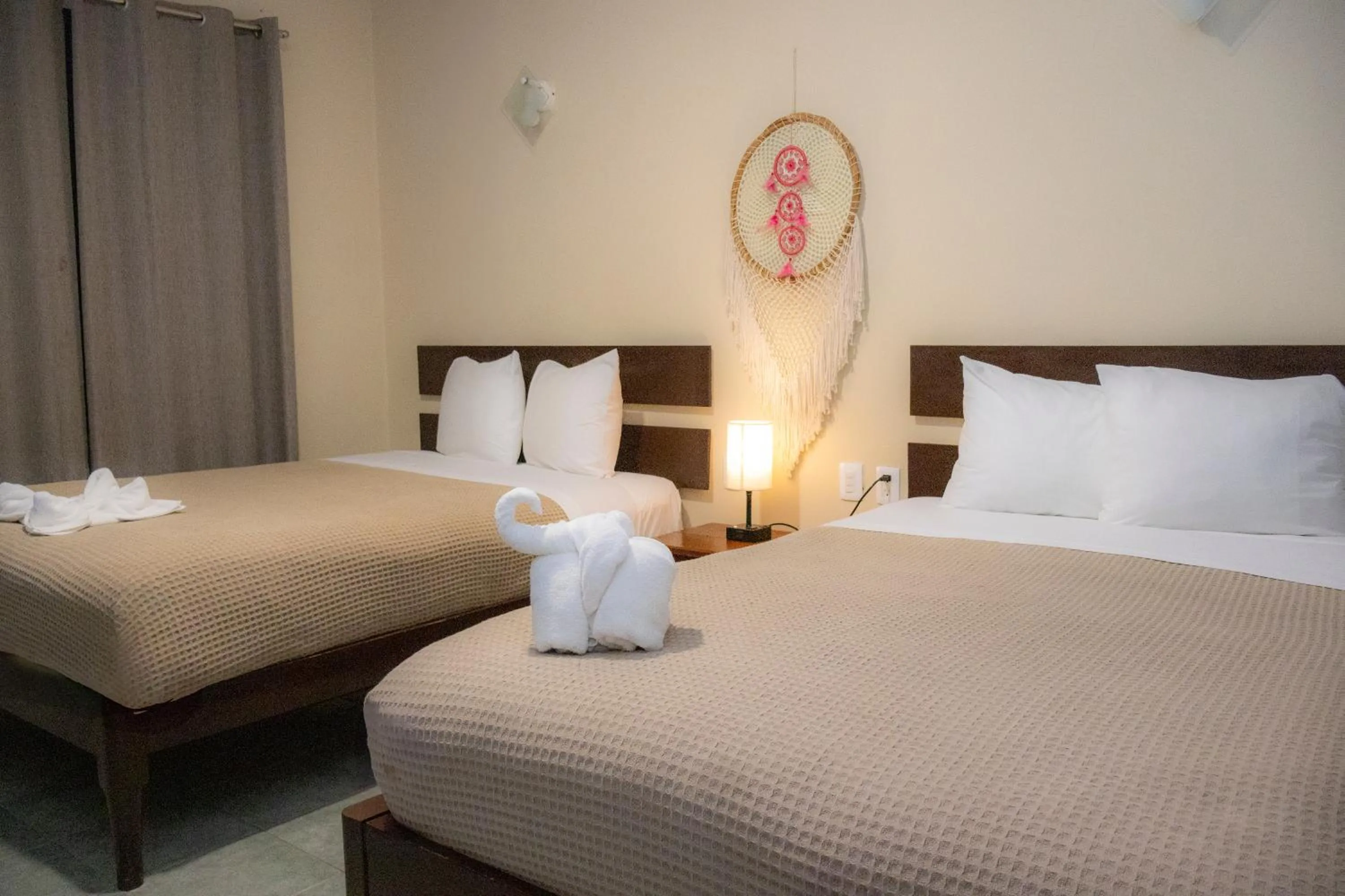 Bed in Ammare Hotel Boutique