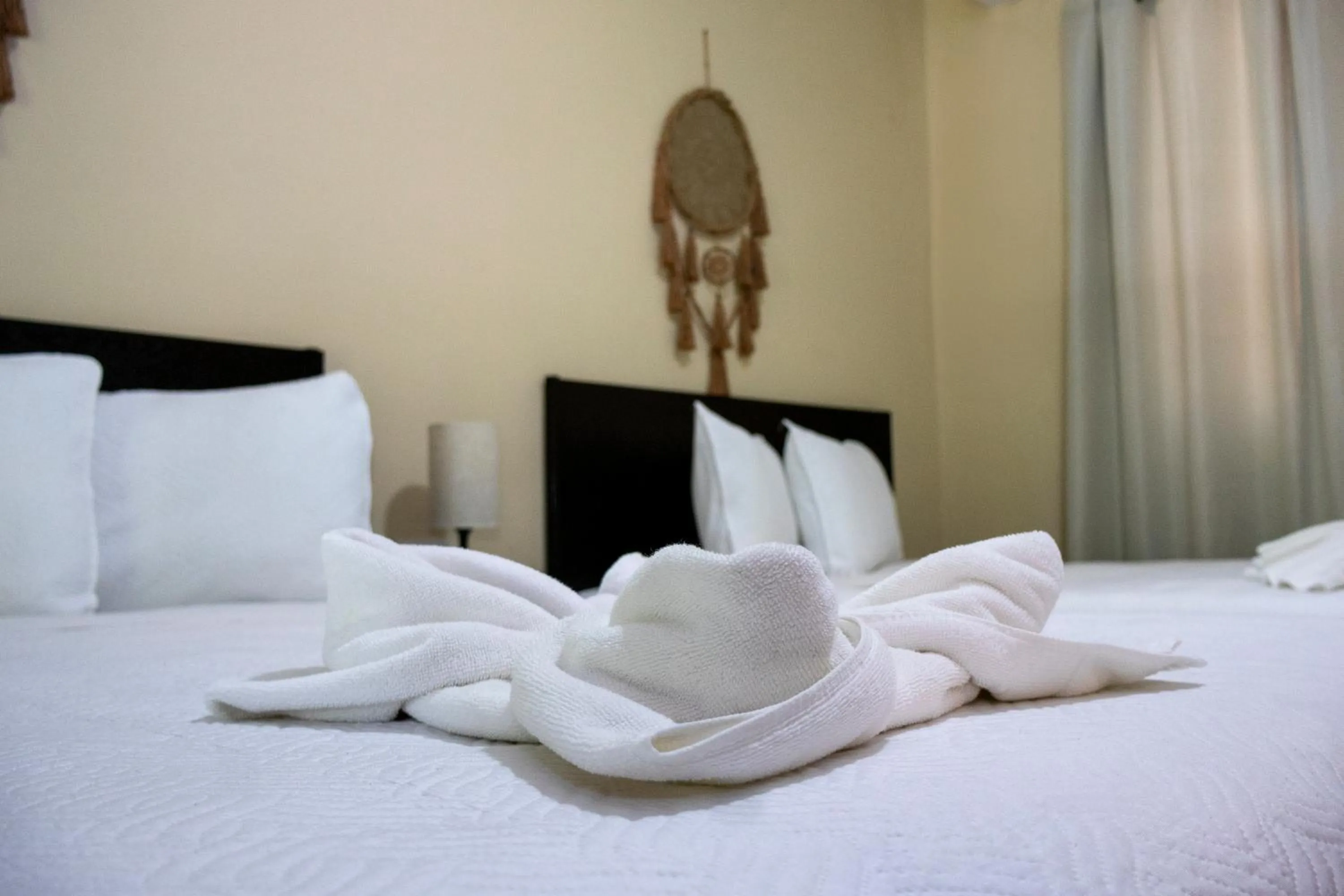 Bed in Ammare Hotel Boutique