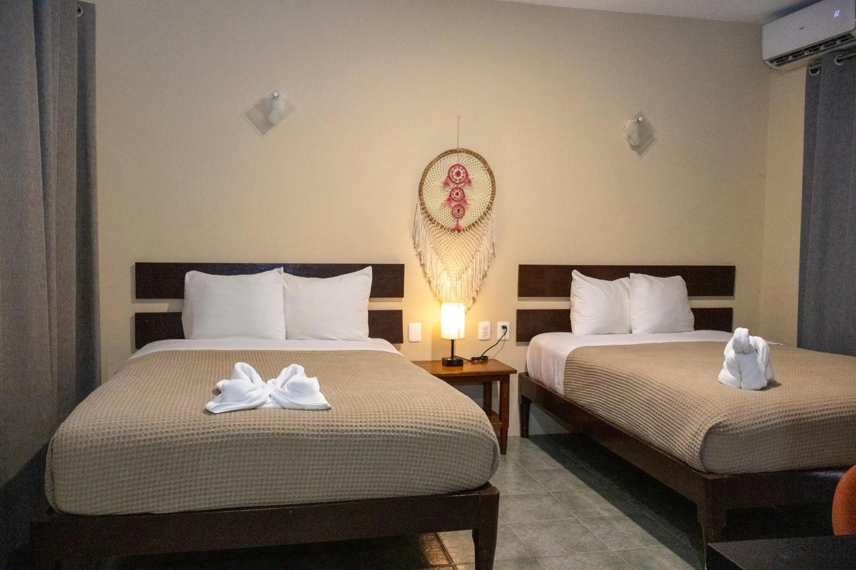 Bed in Ammare Hotel Boutique