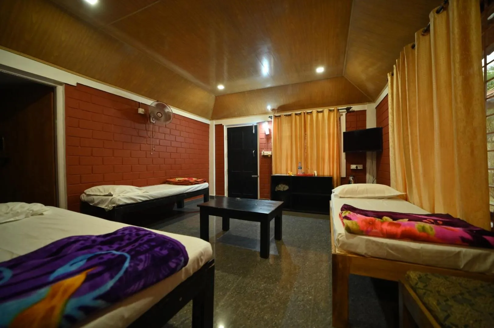 Bed in Coorg HomeStay Resort