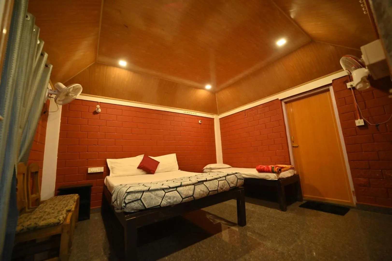 Bed in Coorg HomeStay Resort
