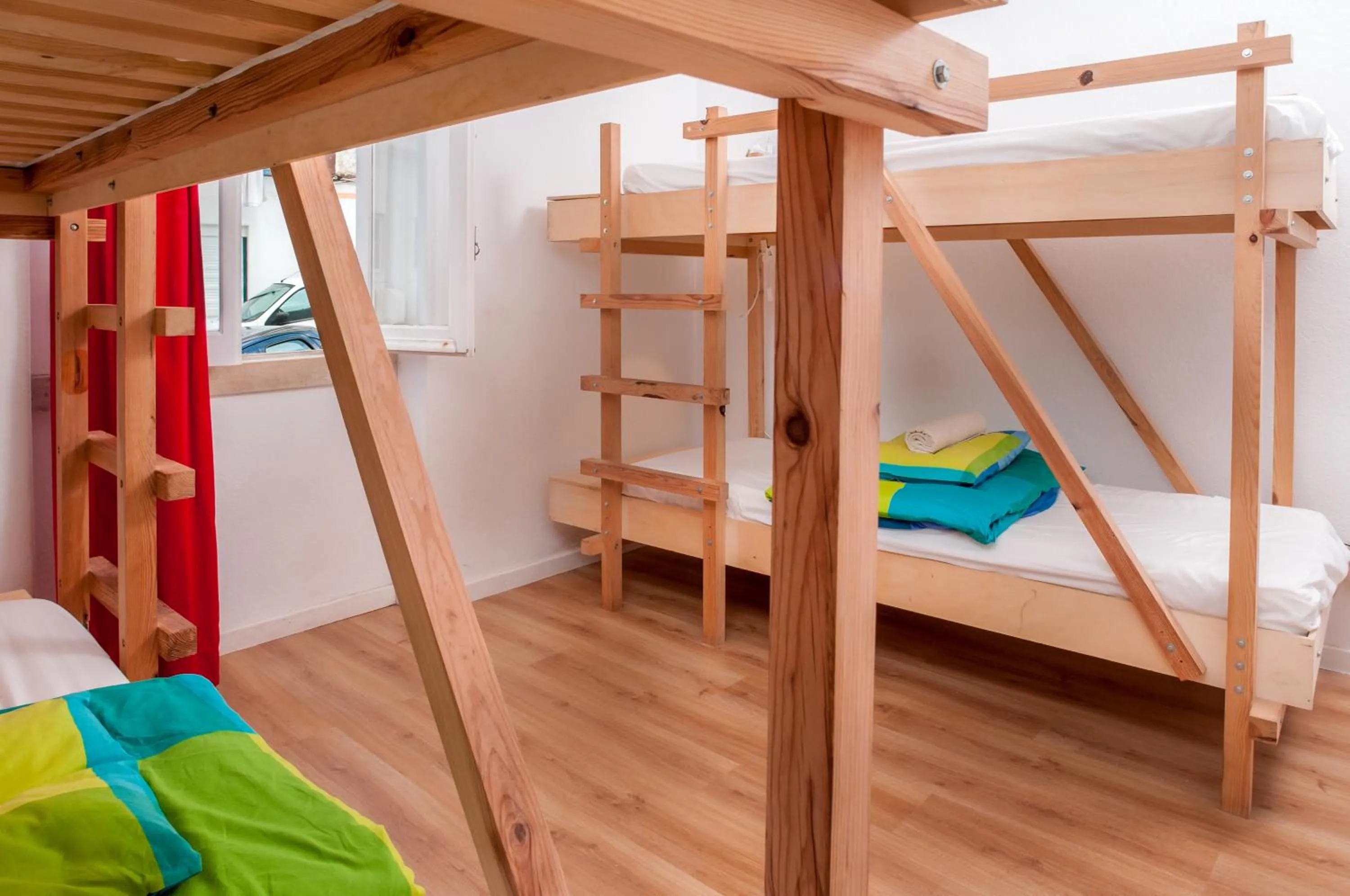 Bedroom, Bed in Nazaré Hostel - Rooms & Dorms