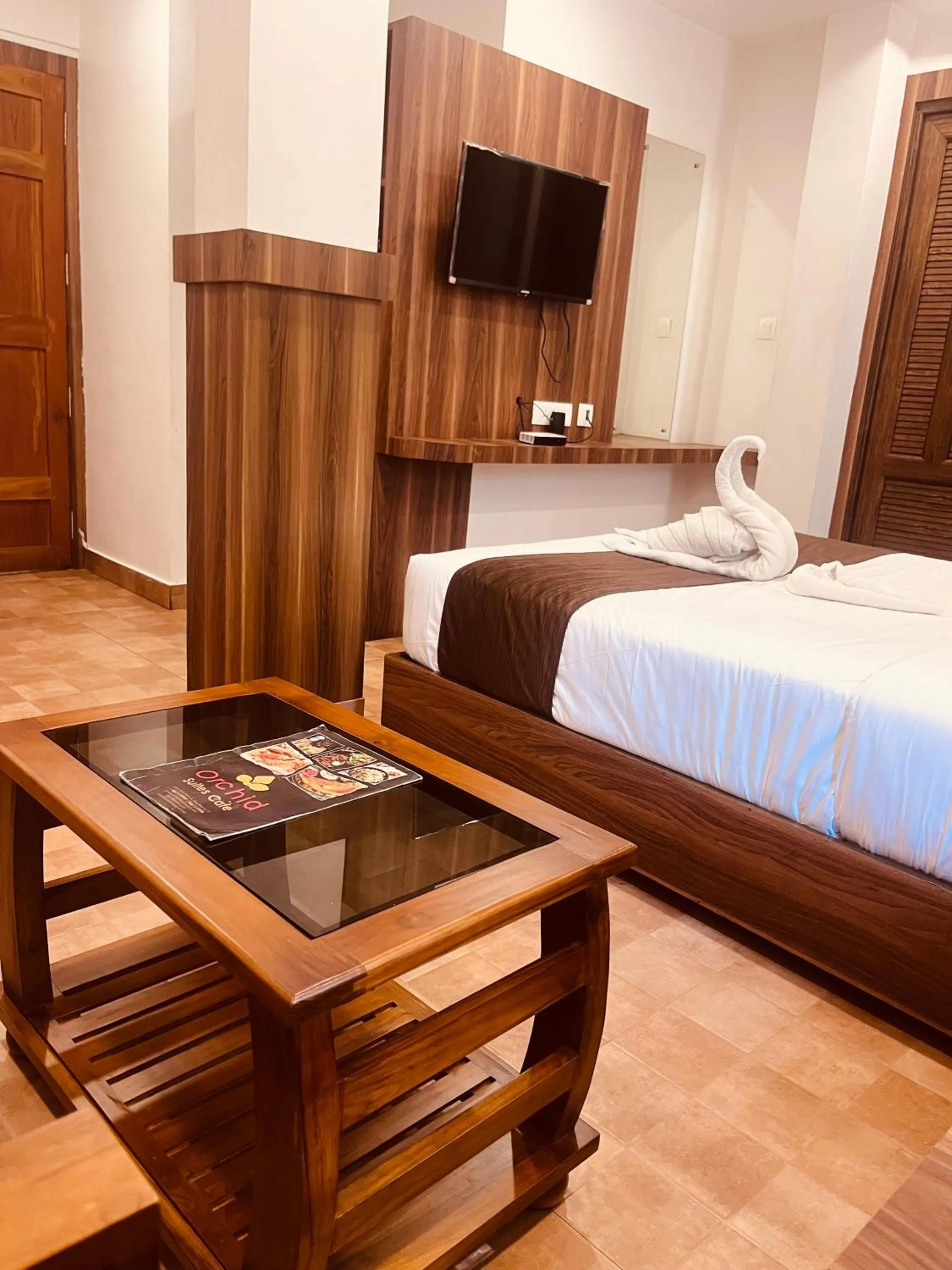 Bed in Hotel orchid suites Cochin