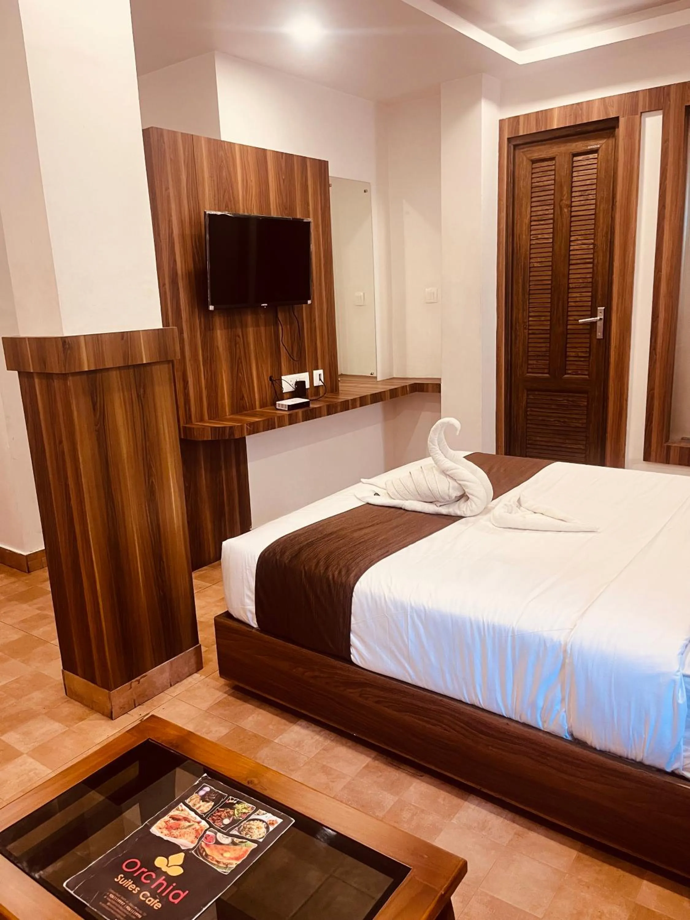 Bed in Hotel orchid suites Cochin