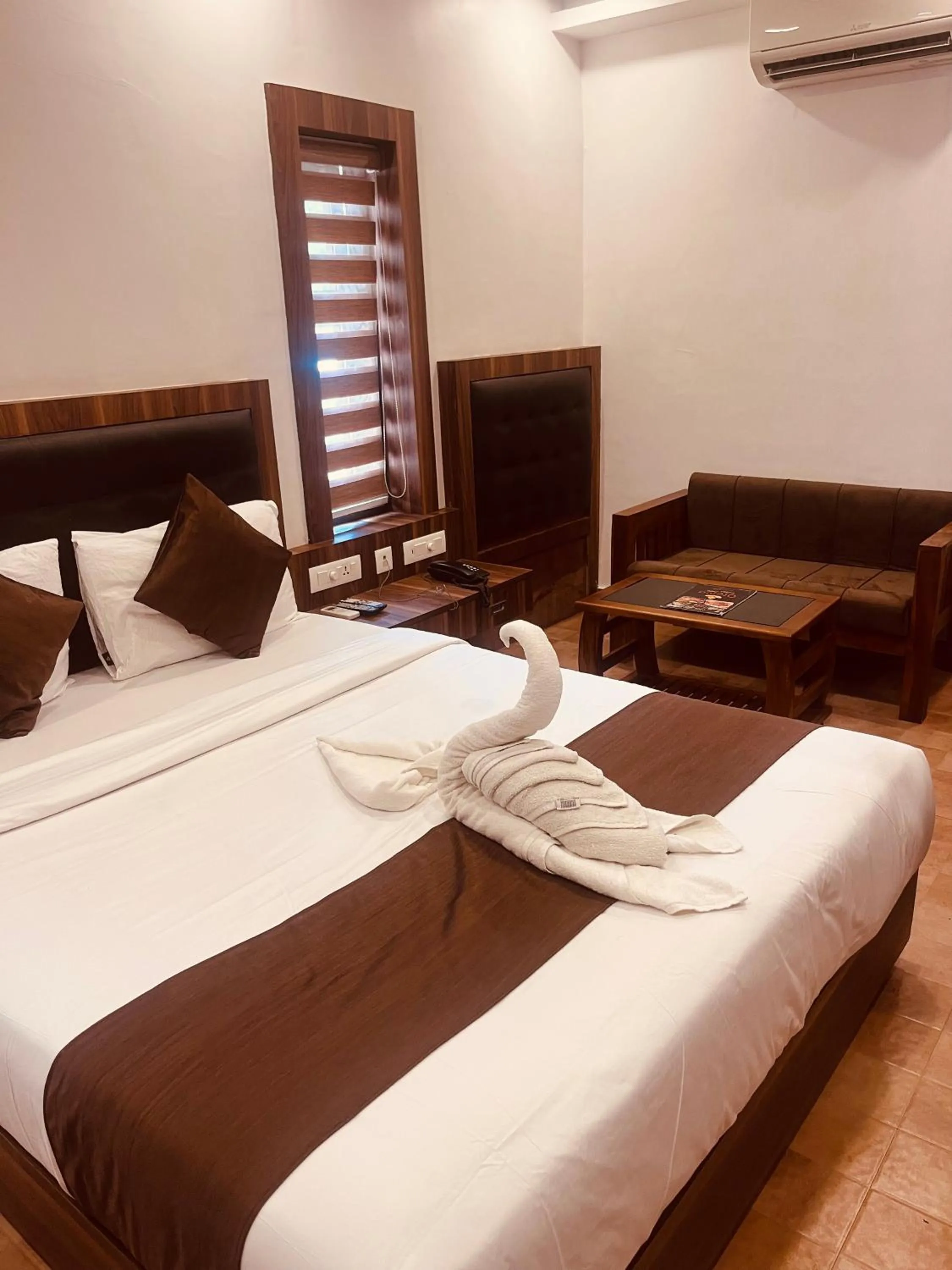 Bed in Hotel orchid suites Cochin