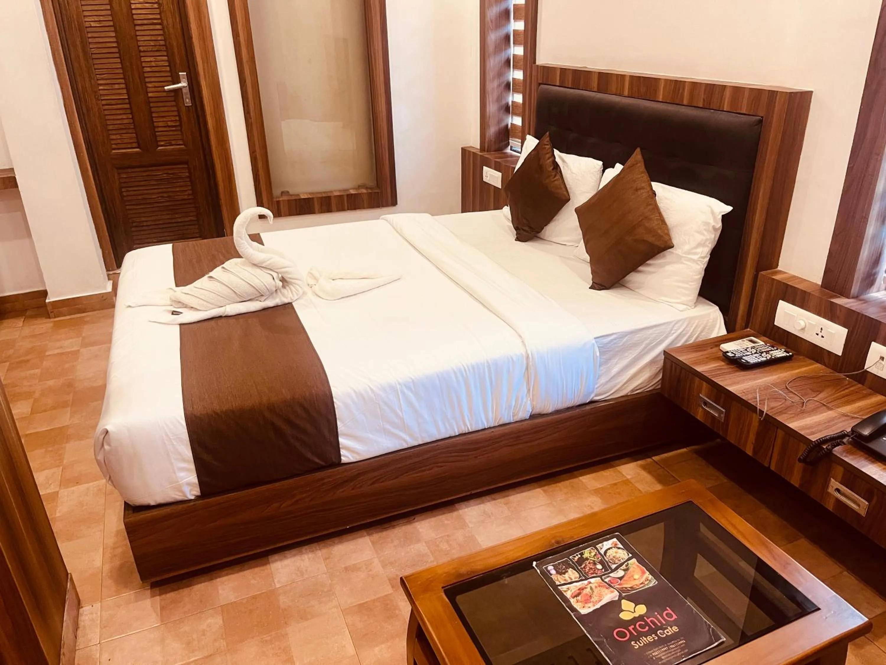 Bed in Hotel orchid suites Cochin