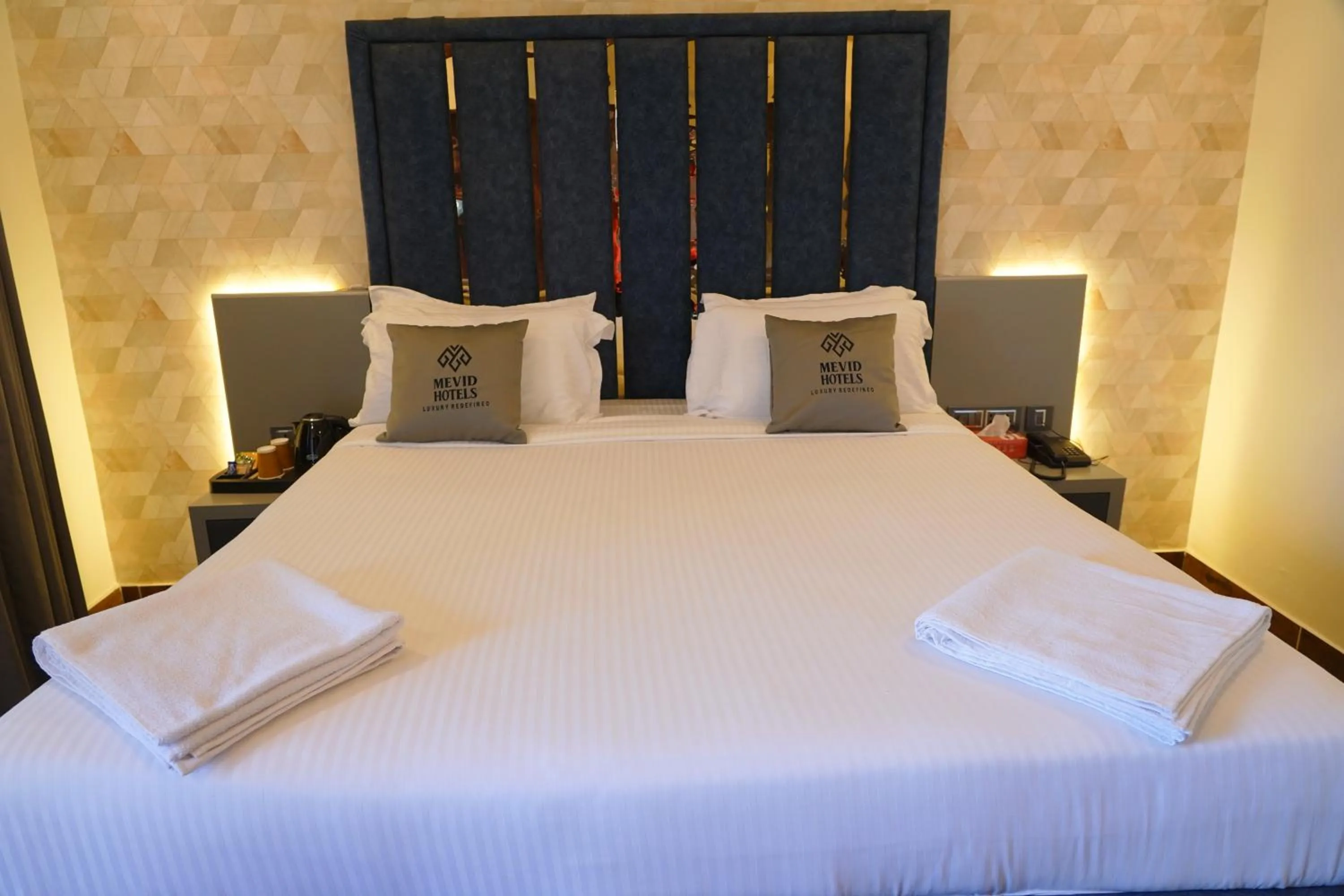 Bed in Mevid Hotels