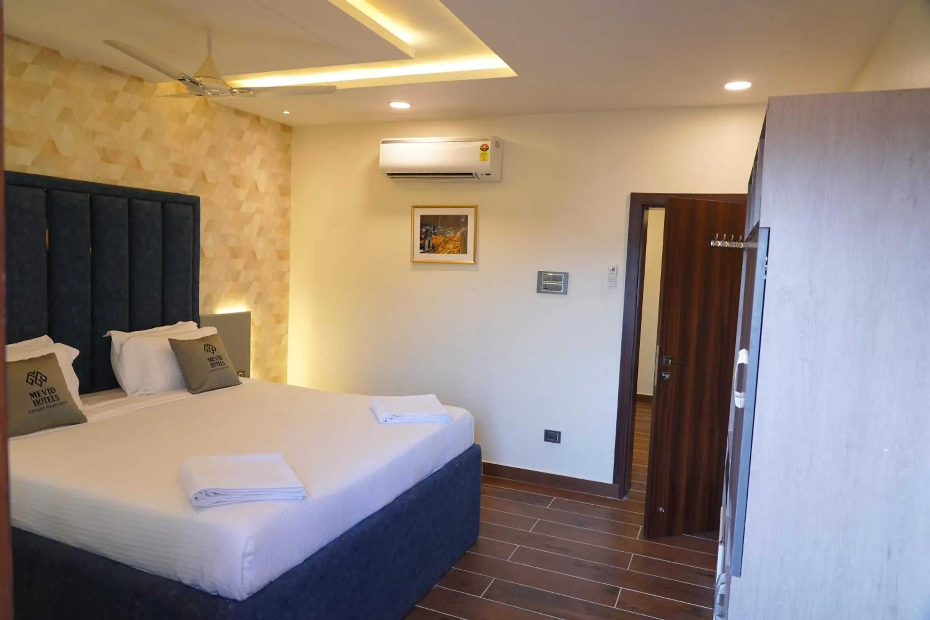 fireplace, Bed in Mevid Hotels fireplace, Bed in Mevid Hotels