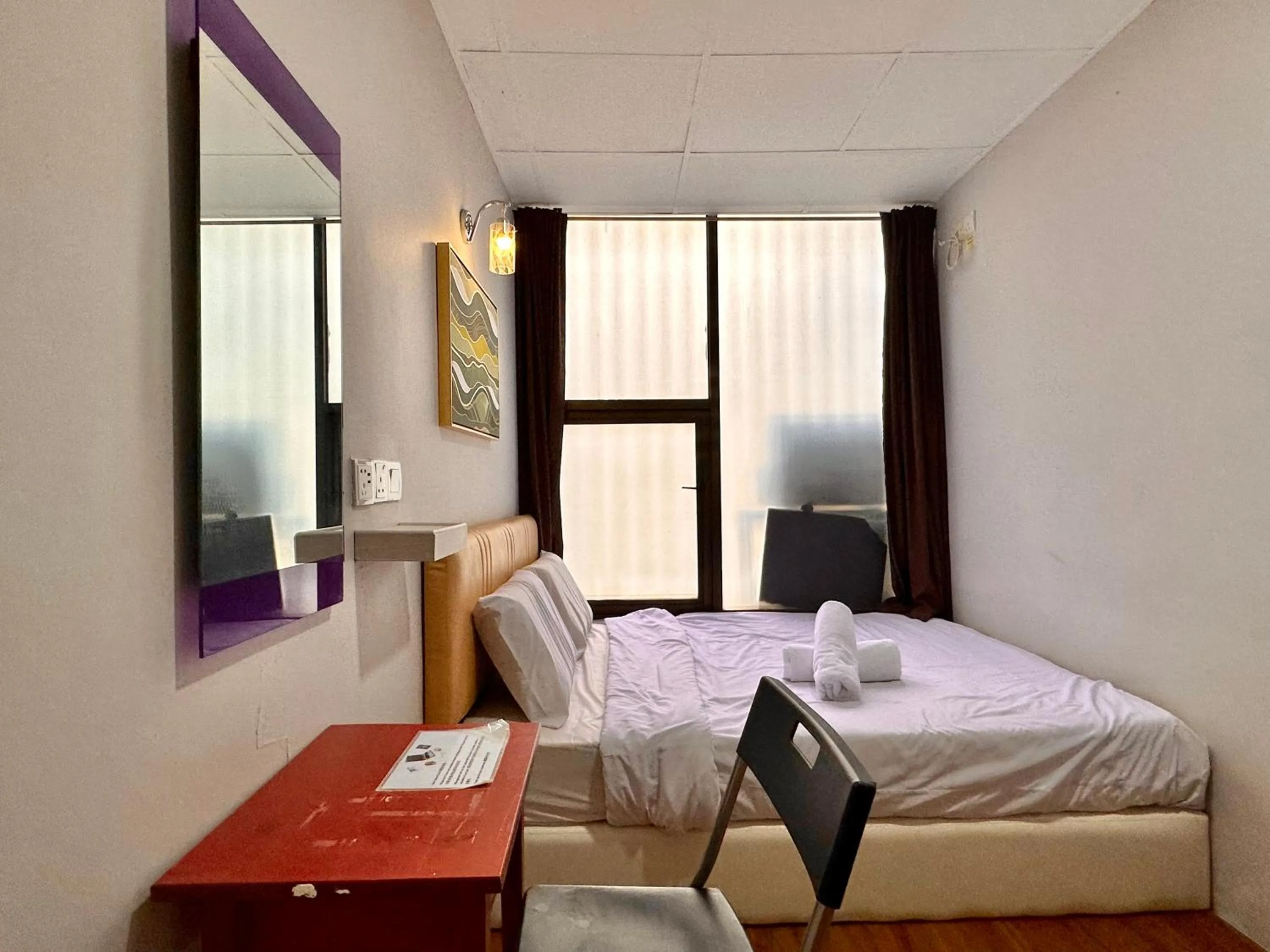 Bedroom in Dingdong Homes Hotel