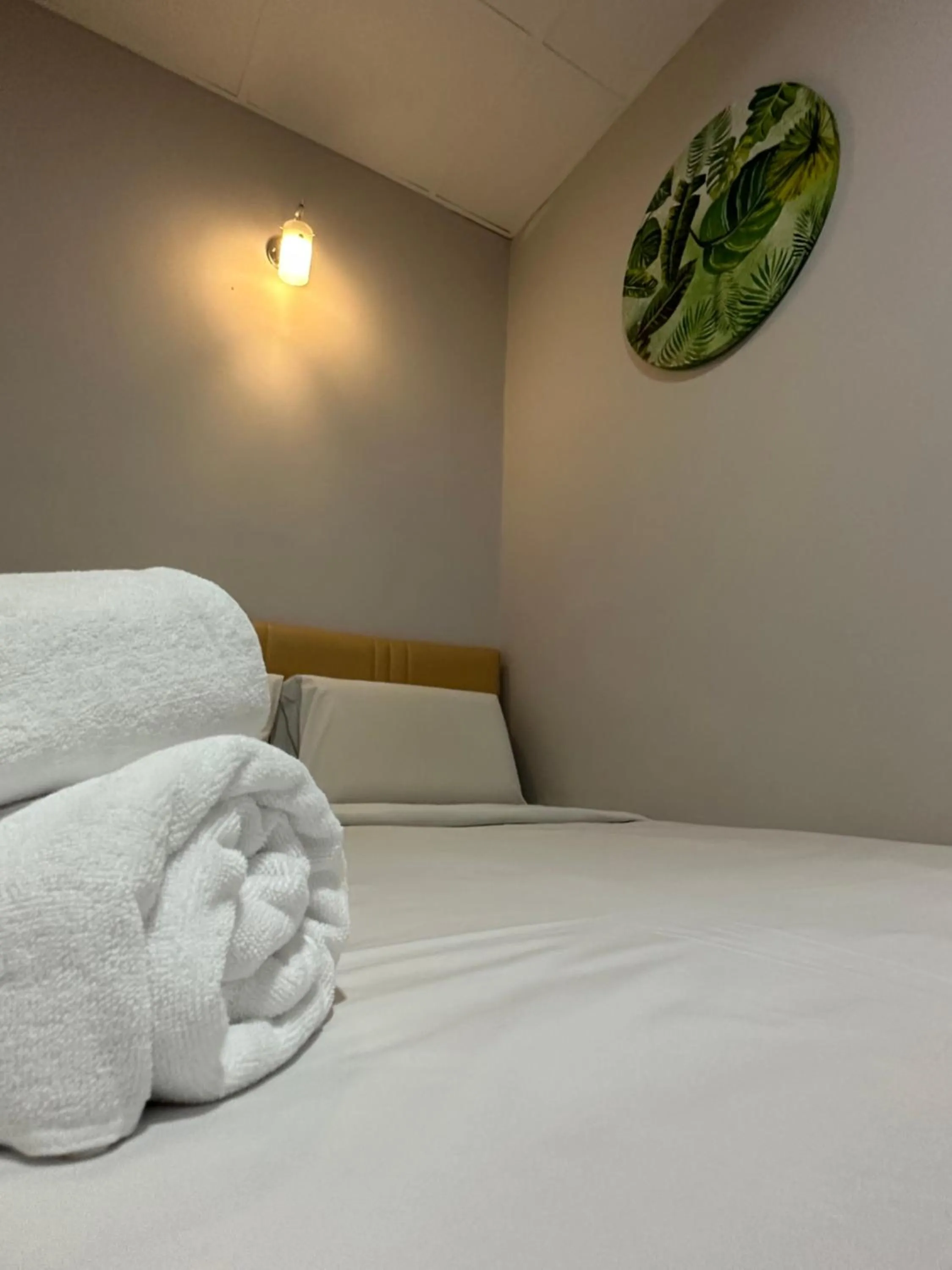 towels in Dingdong Homes Hotel