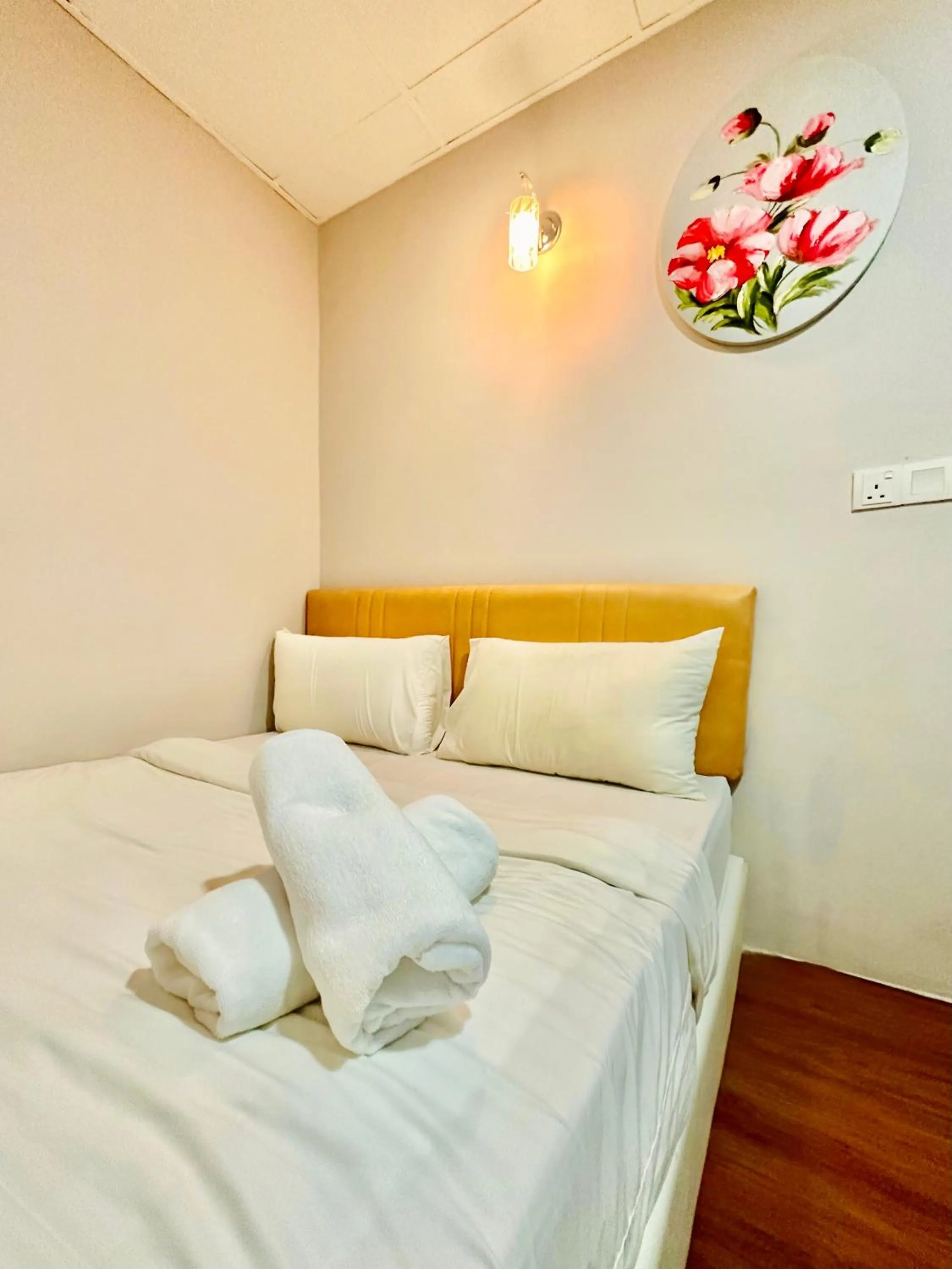 Bedroom in Dingdong Homes Hotel