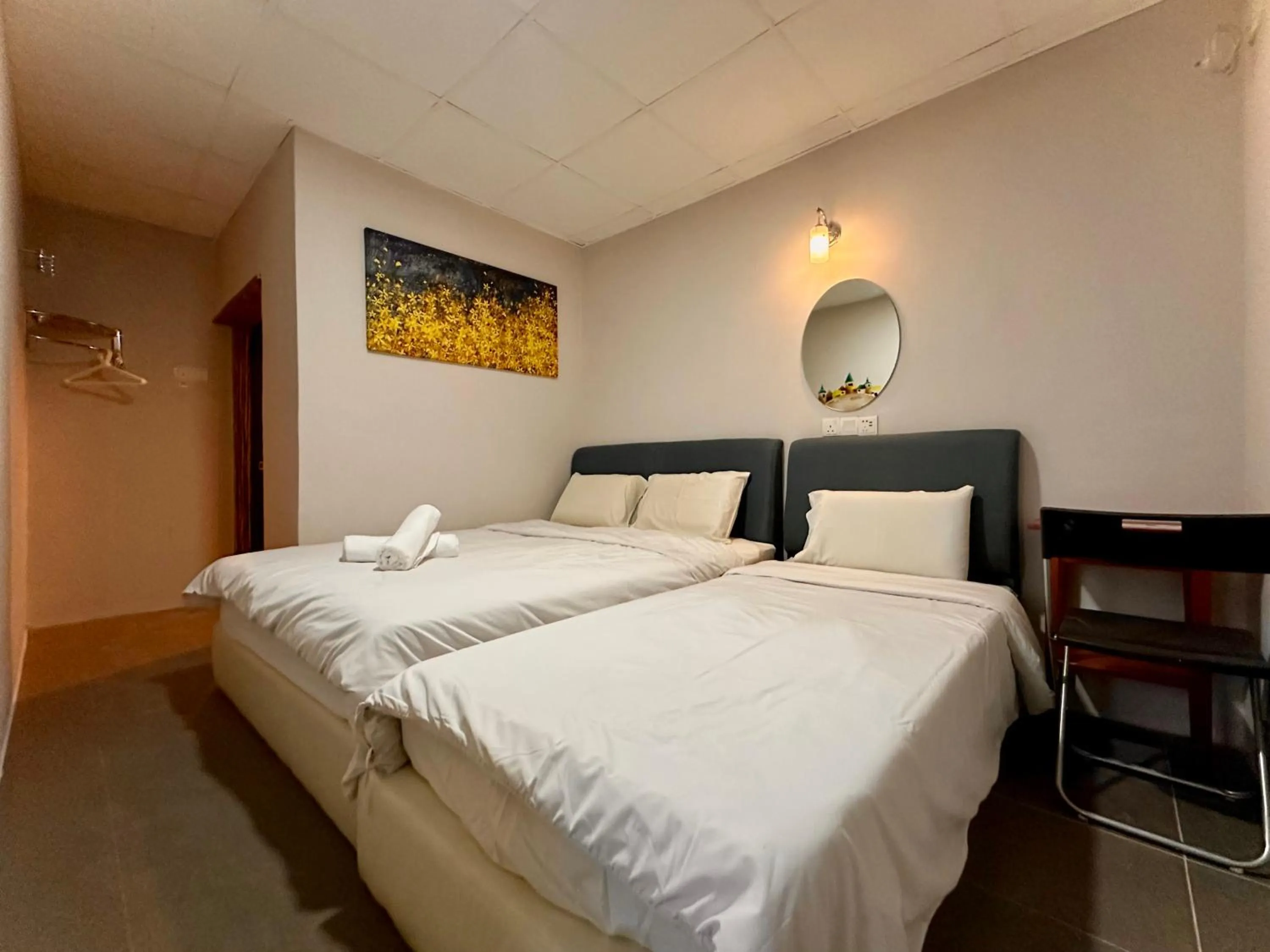 Bed in Dingdong Homes Hotel