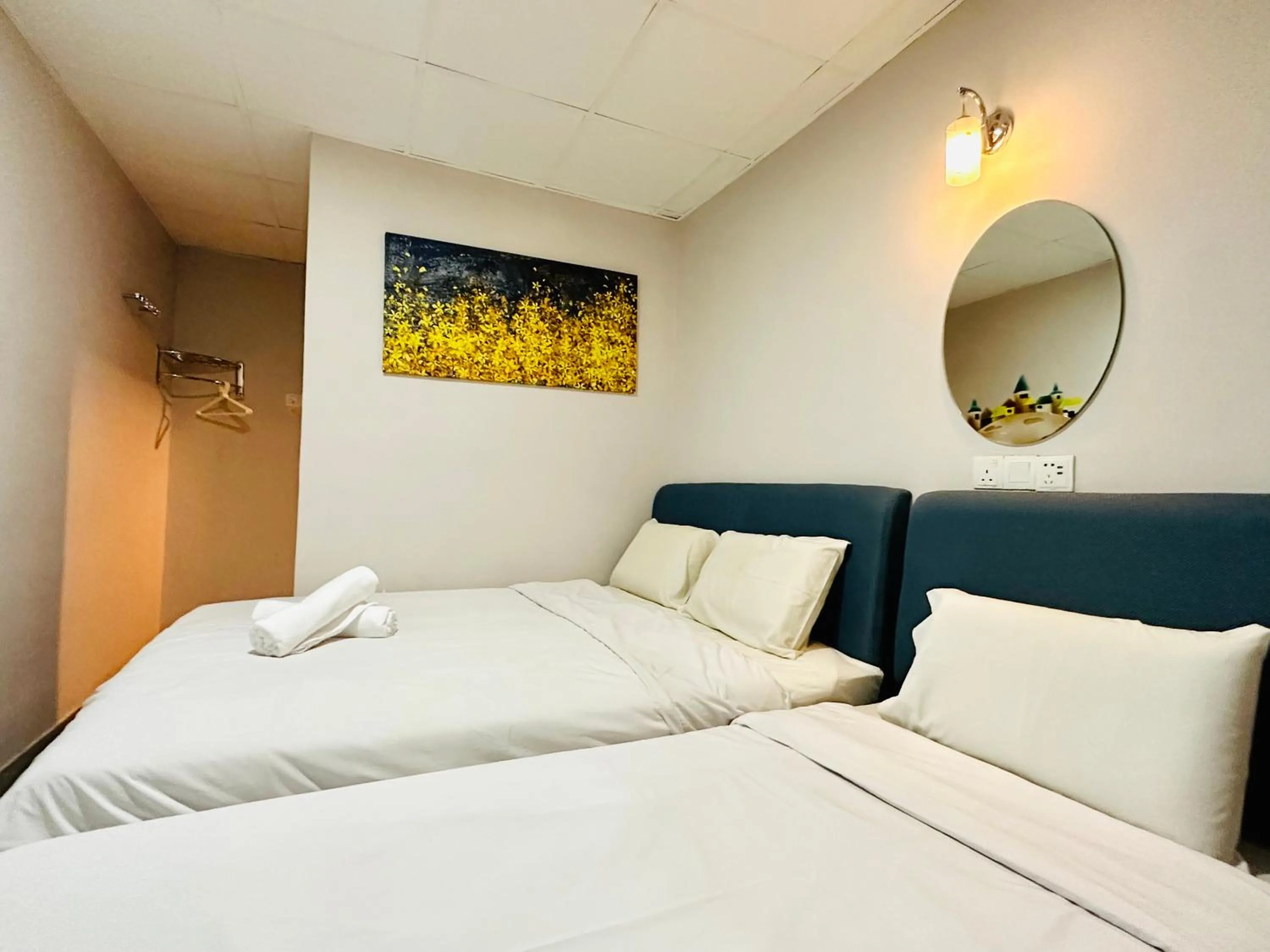 Bed in Dingdong Homes Hotel