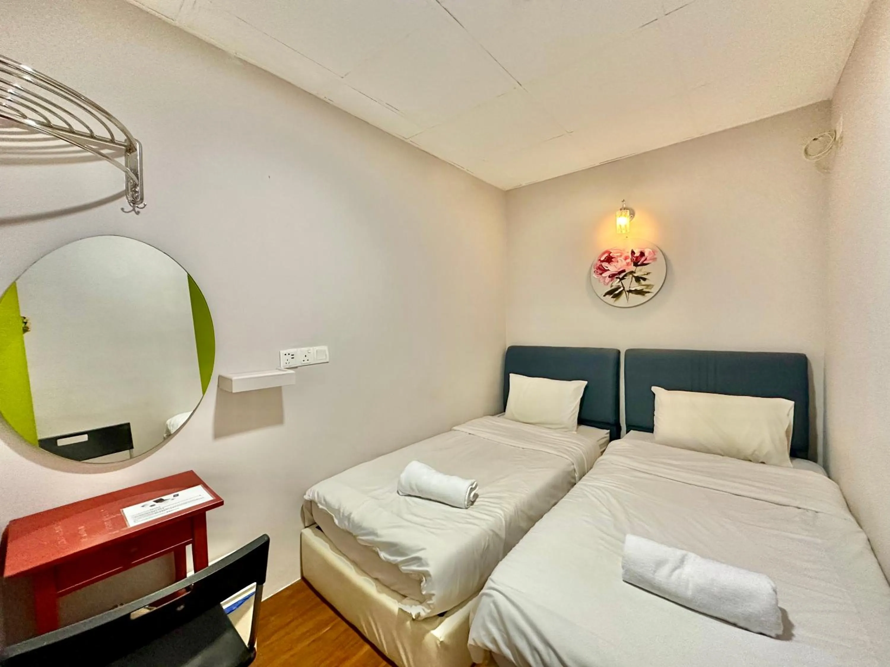 Bed in Dingdong Homes Hotel