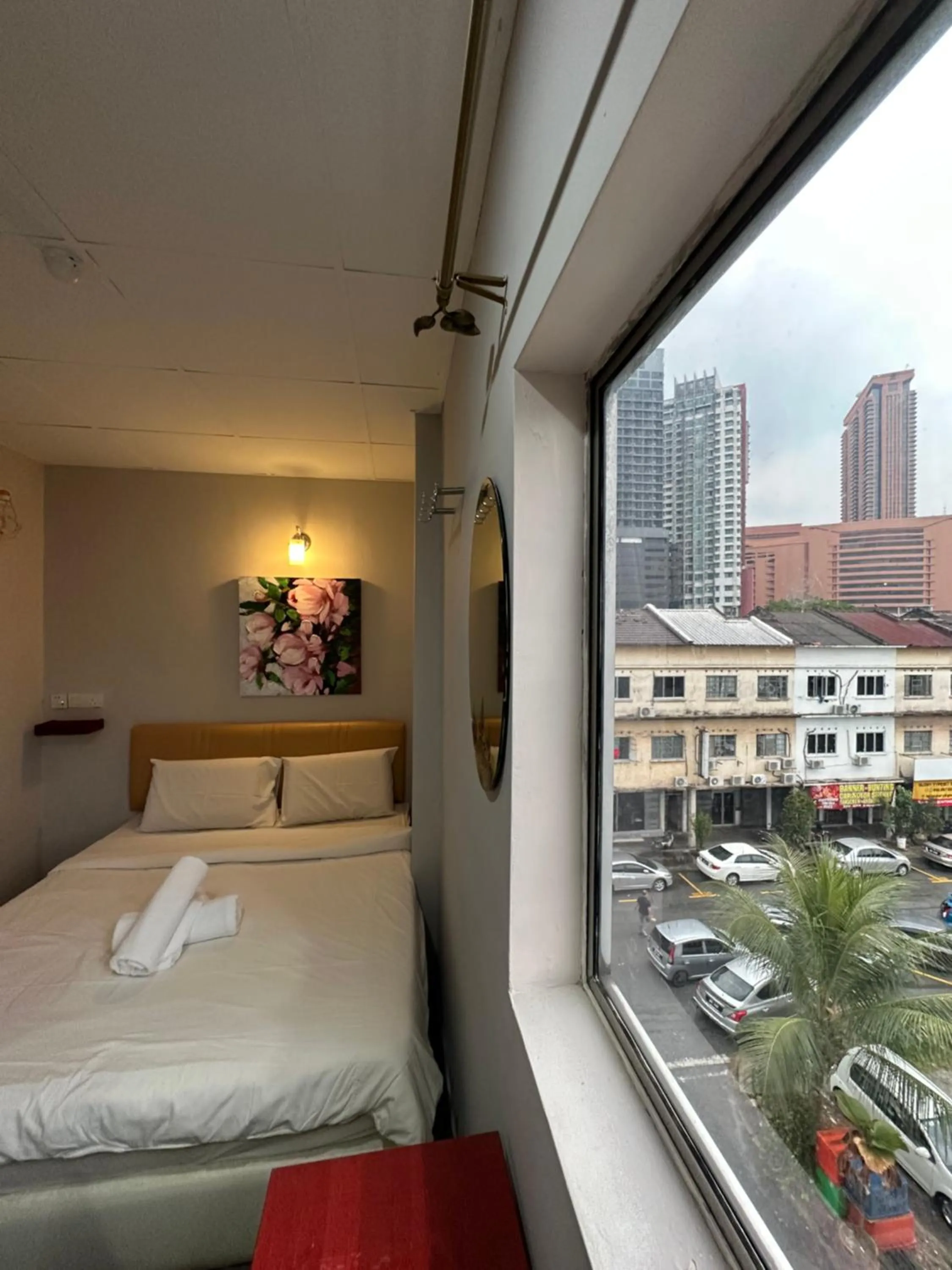 Bed in Dingdong Homes Hotel