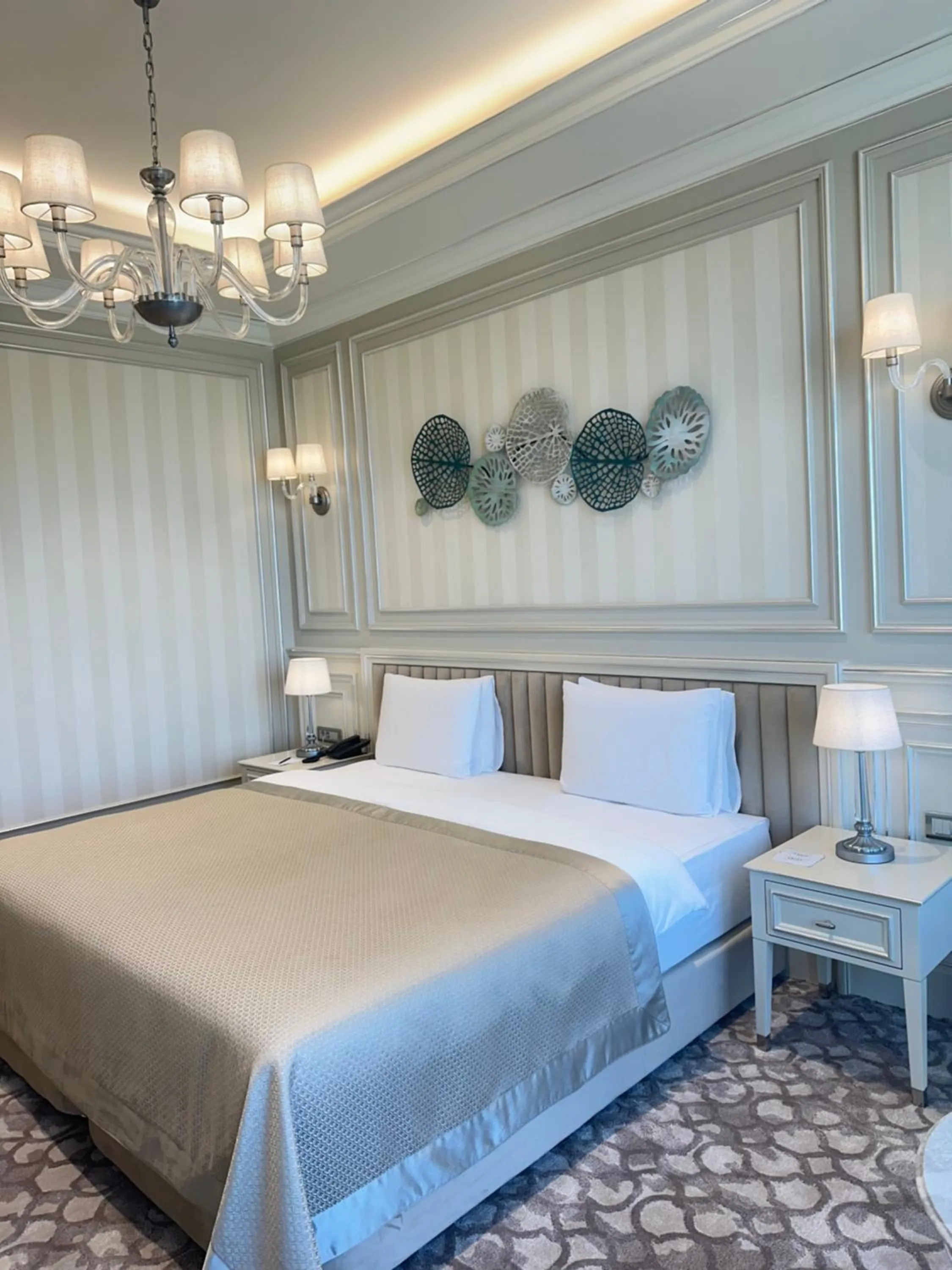 Bed in T-CITY PRESIDENTIAL HOTEL