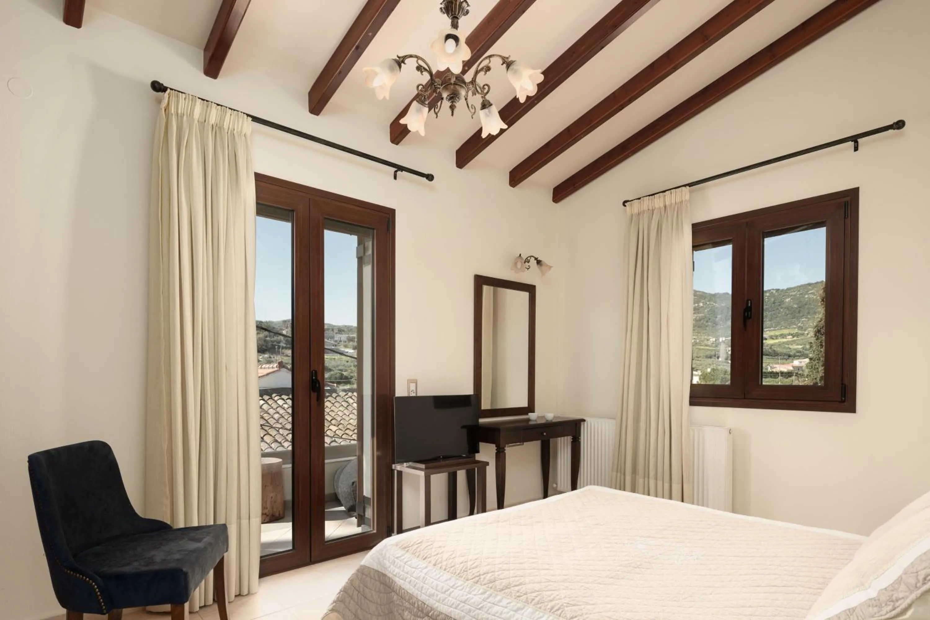 Photo of the whole room, Bed in Manili Boutique Suites & Villas