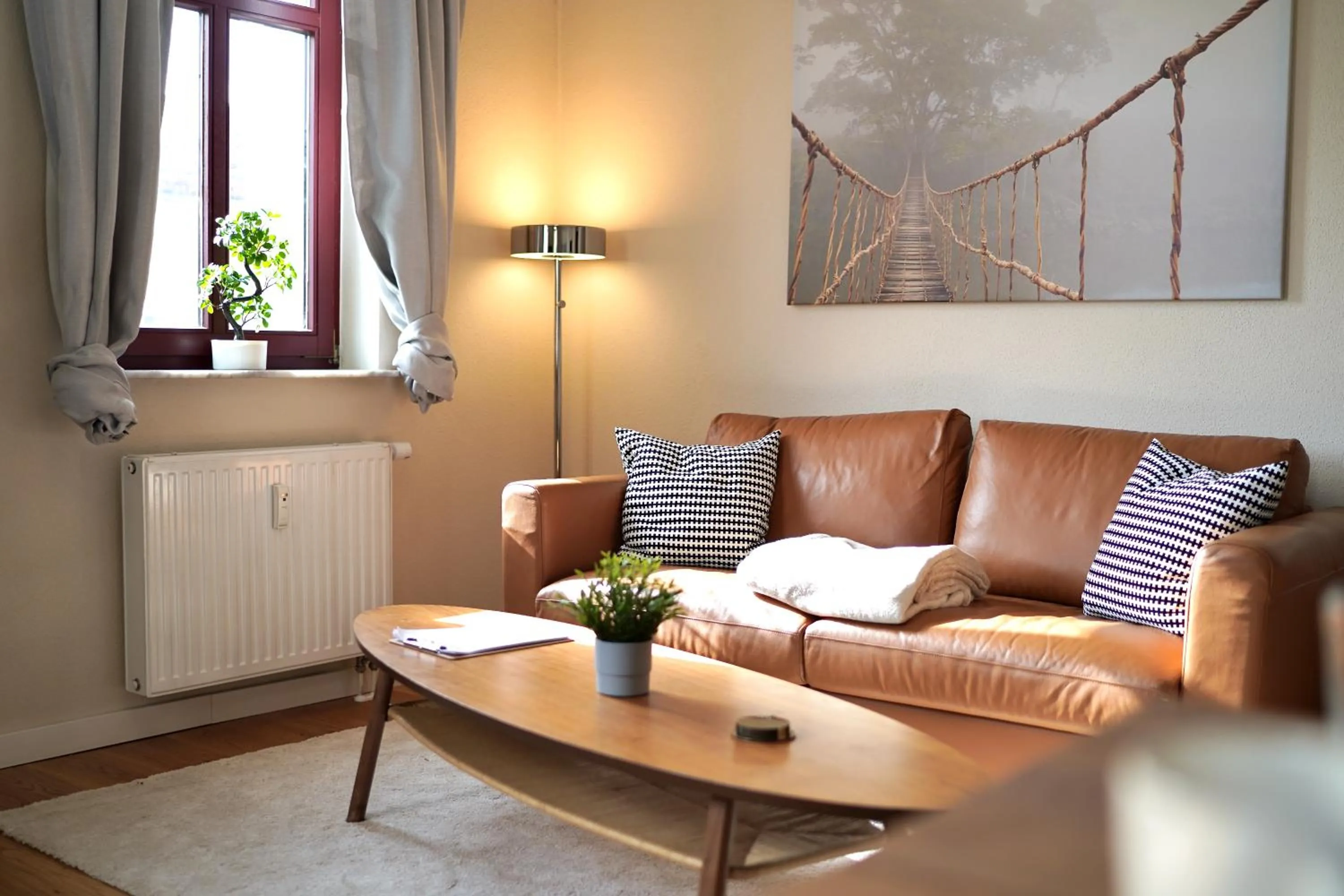 Living room in EDLER WOHNRAUM Noble Stadtoase mit Boxspringbett, Kaffeevollautomat & Parkplatz