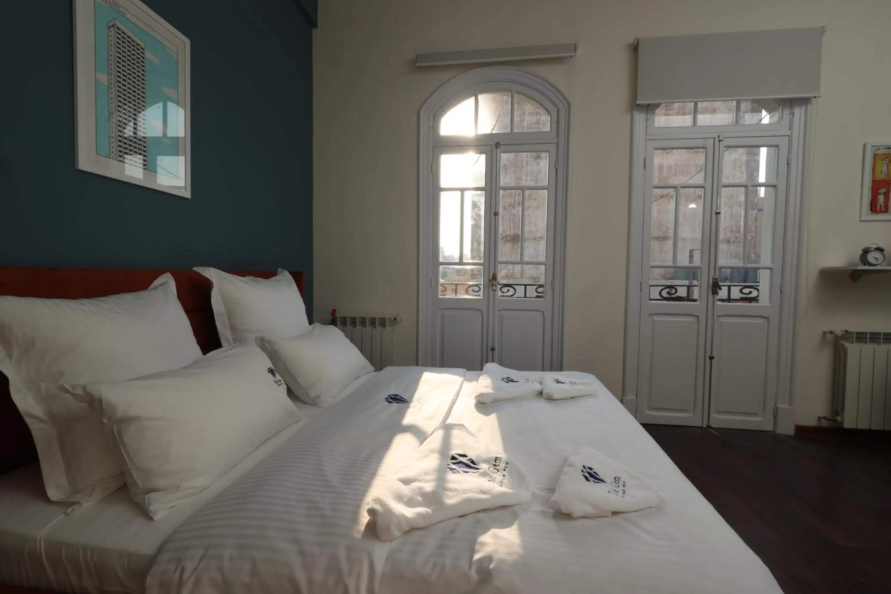 Bed in THE GEM BOUTIQUE HOTEL