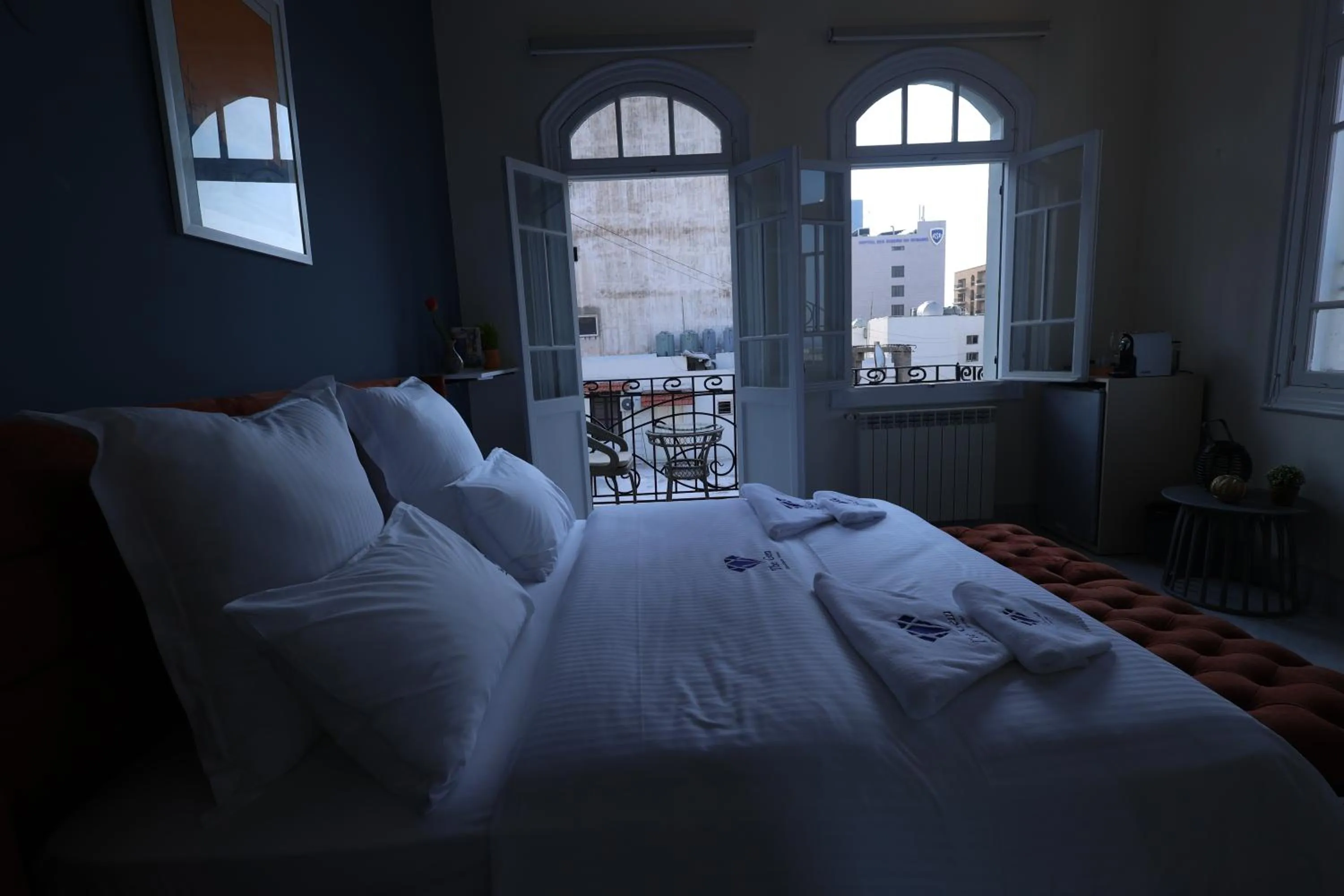 Bed in THE GEM BOUTIQUE HOTEL