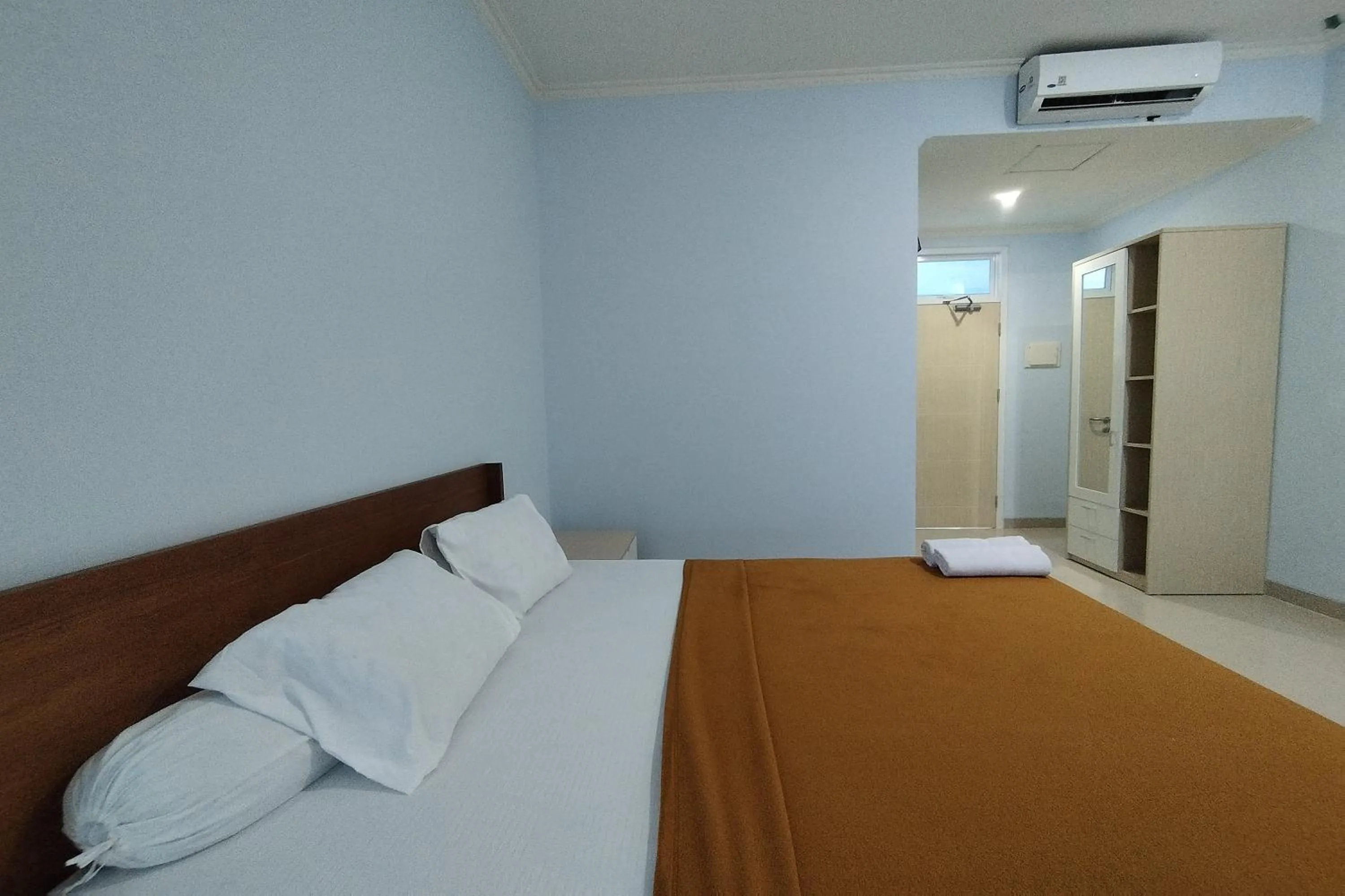 Bed in Hotel Sutha Inn Syariah