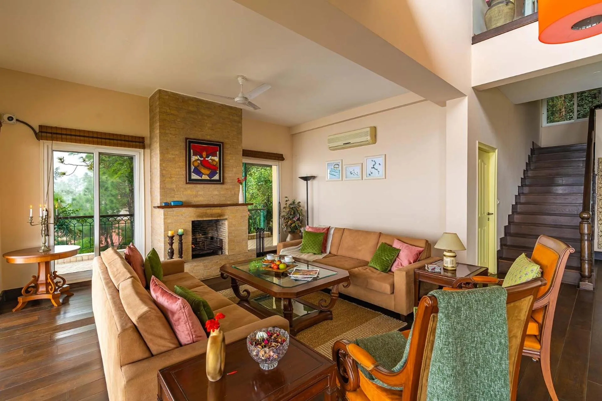 Living room in StayVista at Ludlow House Luxury Villa with Lawn & Fireplace at Mall Road