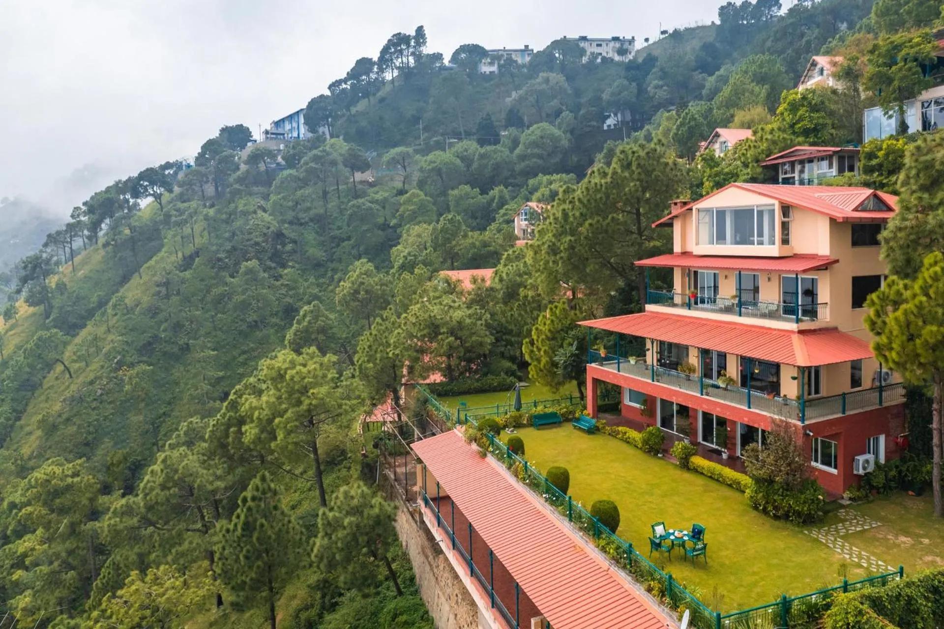 Property building in StayVista at Ludlow House Luxury Villa with Lawn & Fireplace at Mall Road