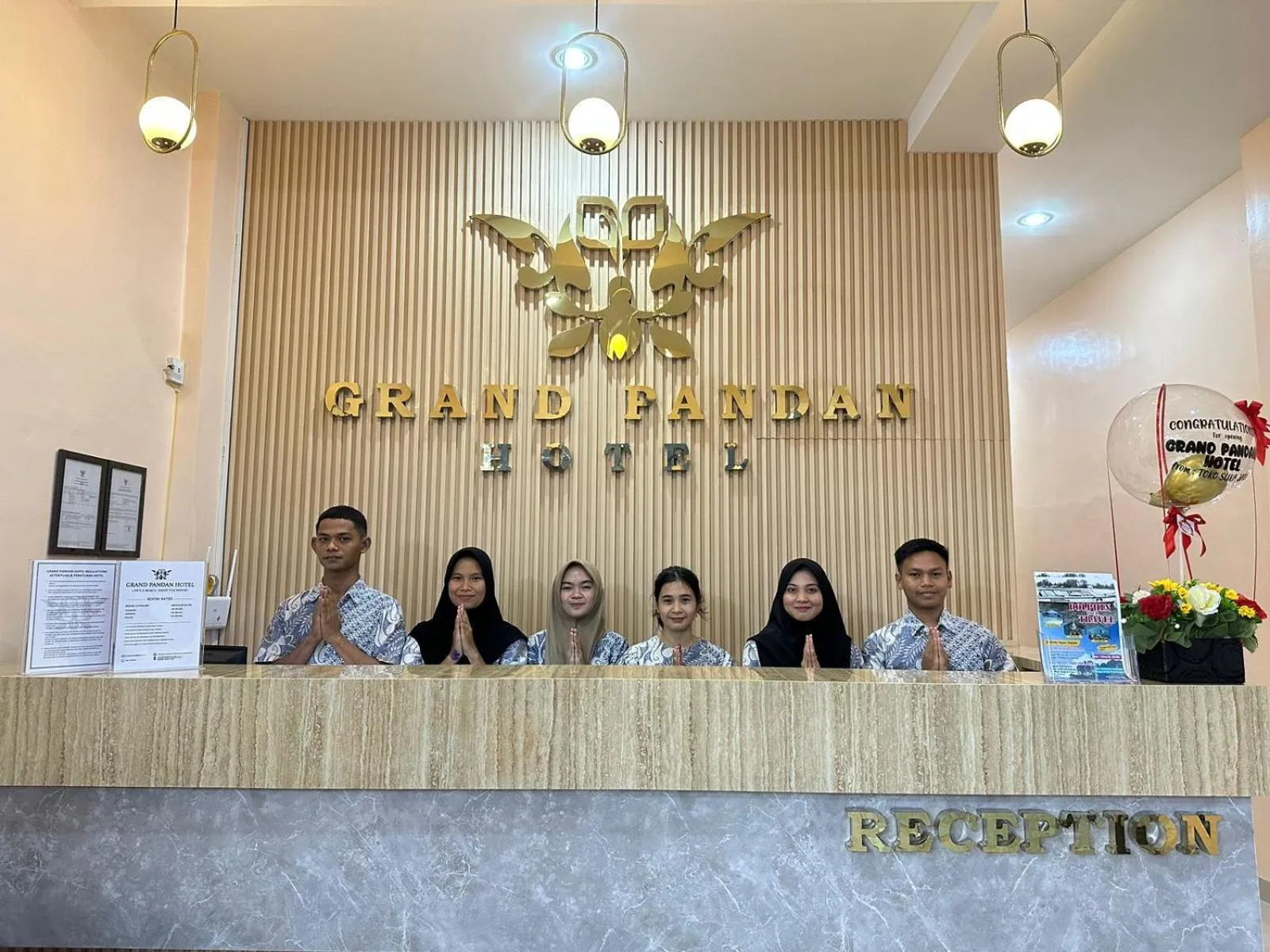 Staff in GRAND PANDAN HOTEL