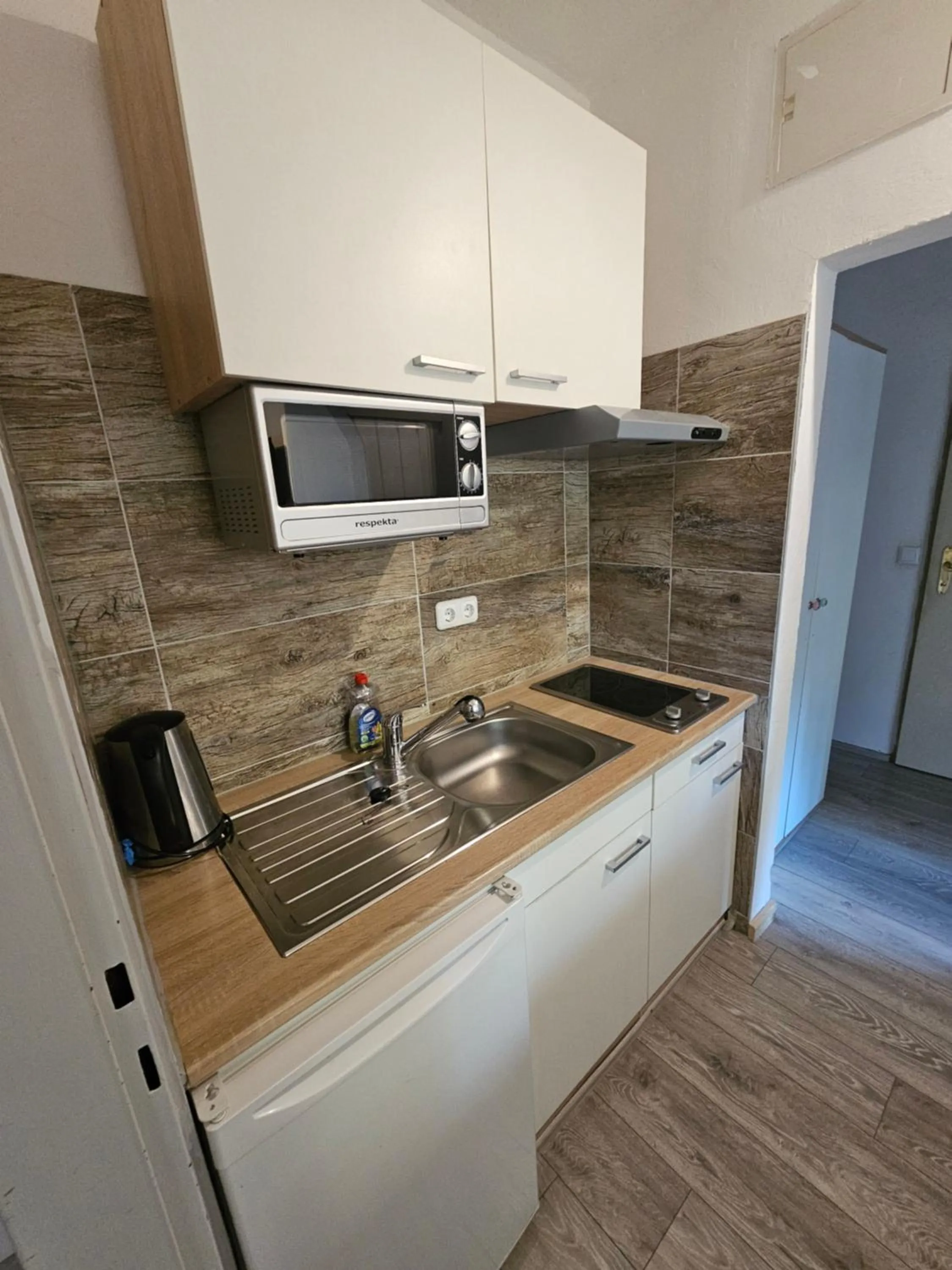 Kitchen or kitchenette in Karawanken Lodge