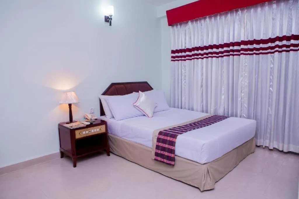 Bed in Meridian Hotel & Restaurant