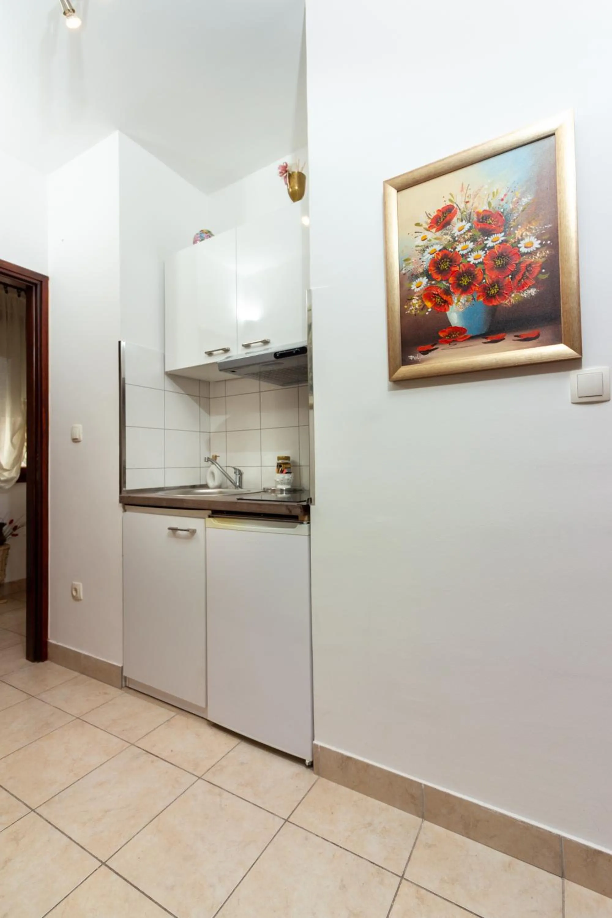 Kitchen or kitchenette in Apartments Cordis