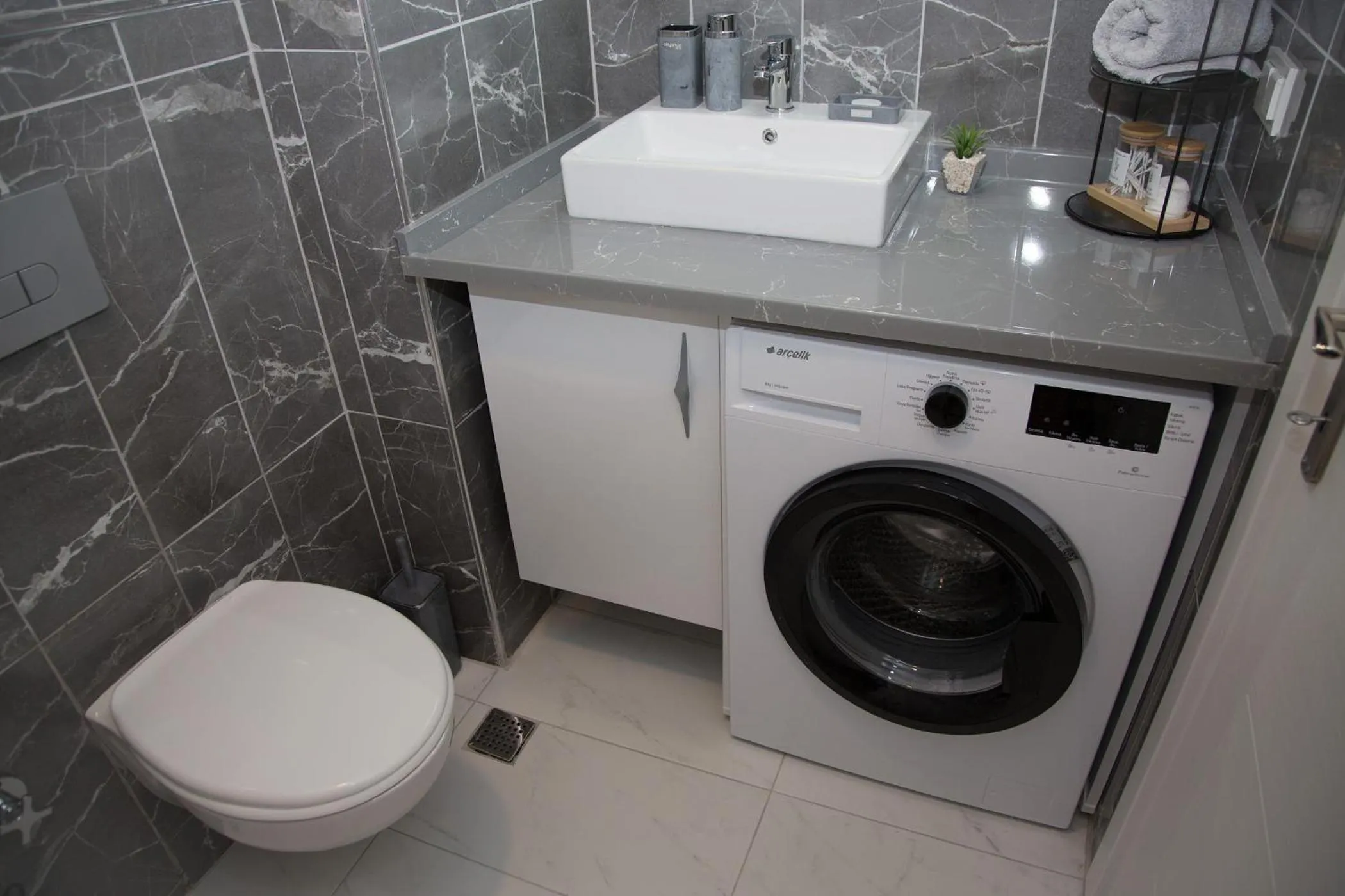 washing machine in ArtLife apartments (FAUNA)