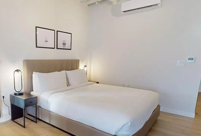 Bed in Steveston Waterfront Hotel