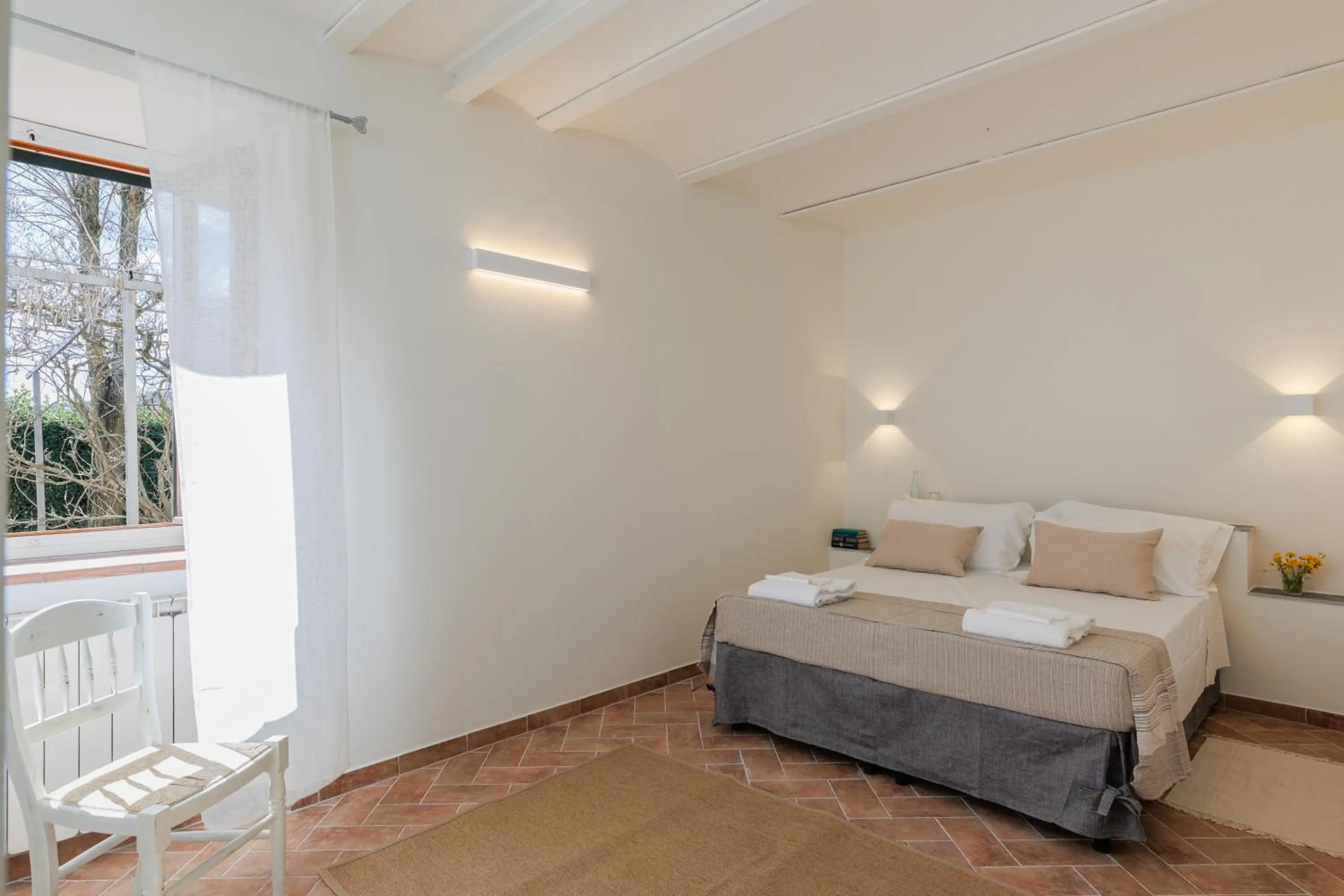 Bed in Fattoria Pagnana Suites & Pool